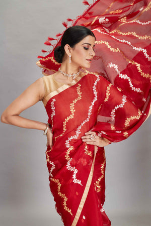 Buy red organza Banarasi sari online in USA with silver golden zari work. Look your best on festive occasions in latest designer sarees, pure silk sarees, Kanjivaram silk saris, handwoven saris, tussar silk sarees, embroidered saris from Pure Elegance Indian clothing store in USA.-closeup