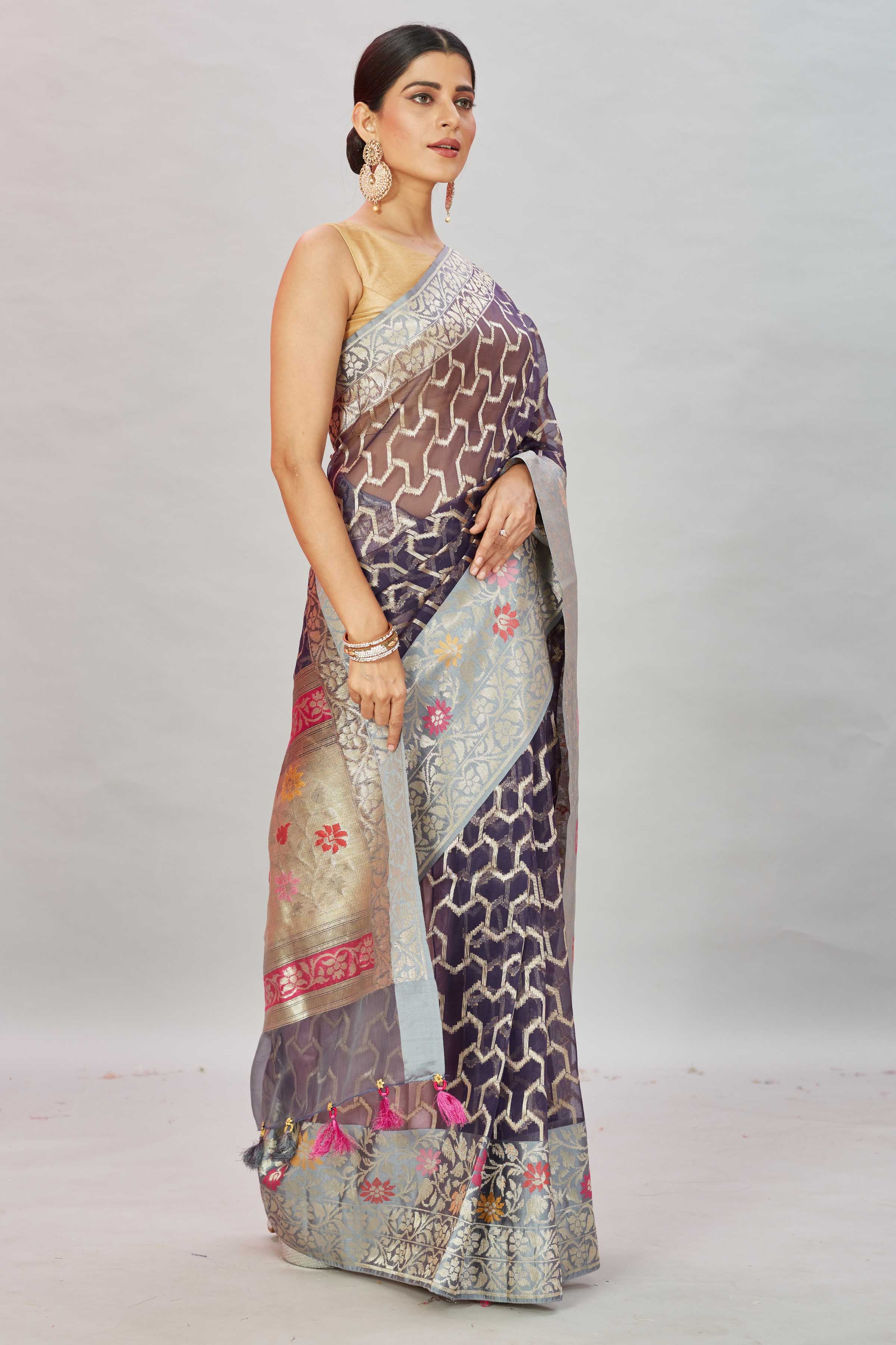 Shop black Kora Banarasi sari online in USA with overall zari jaal. Look your best on festive occasions in latest designer sarees, pure silk sarees, Kanjivaram silk saris, handwoven saris, tussar silk sarees, embroidered saris from Pure Elegance Indian clothing store in USA.-side