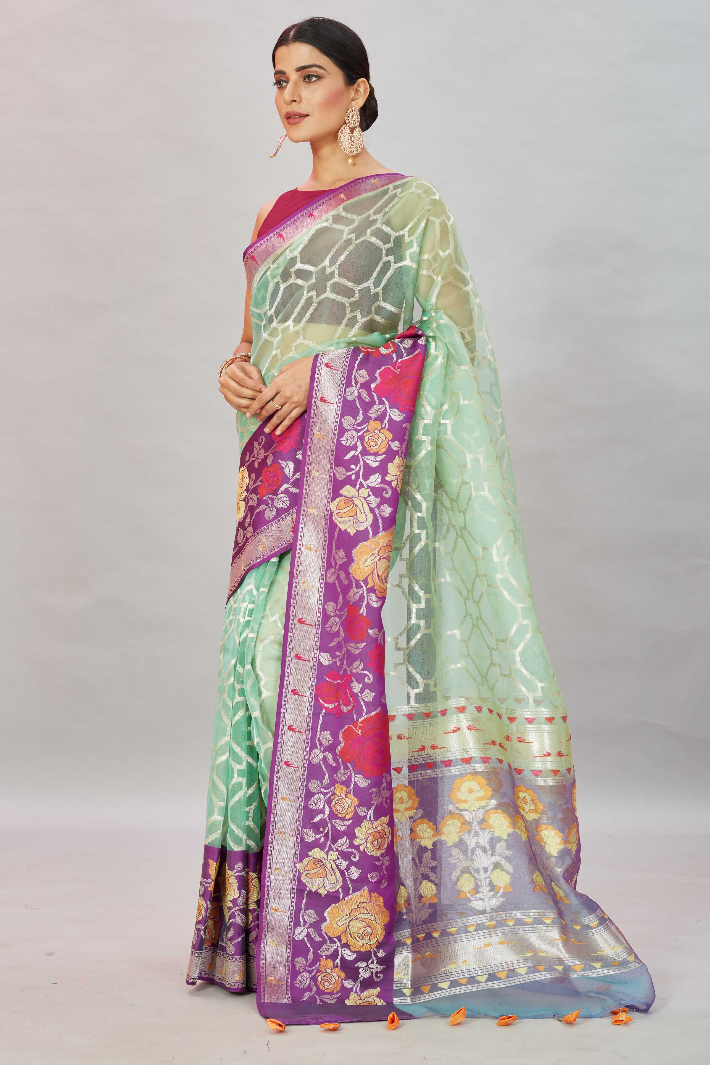 Buy pastel green Kora Banarasi sari online in USA with overall zari jaal. Look your best on festive occasions in latest designer sarees, pure silk sarees, Kanjivaram silk saris, handwoven saris, tussar silk sarees, embroidered saris from Pure Elegance Indian clothing store in USA.-side