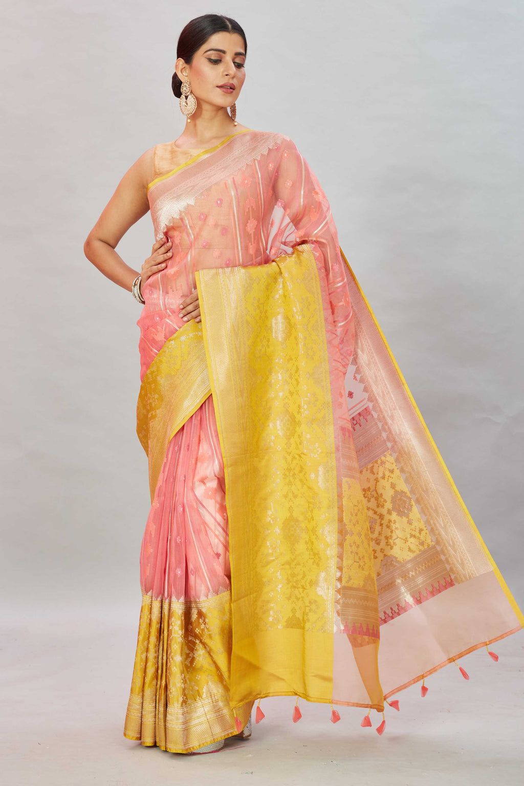 Buy stunning pink Kora Banarasi sari online in USA with yellow border. Look your best on festive occasions in latest designer sarees, pure silk sarees, Kanjivaram silk saris, handwoven saris, tussar silk sarees, embroidered saris from Pure Elegance Indian clothing store in USA.-full view