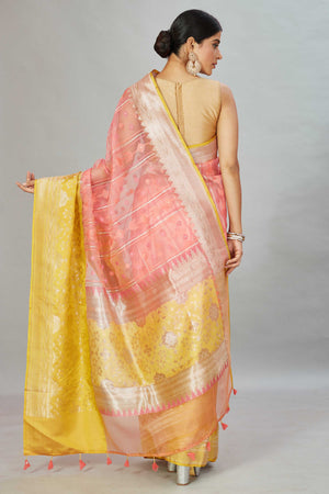 Buy stunning pink Kora Banarasi sari online in USA with yellow border. Look your best on festive occasions in latest designer sarees, pure silk sarees, Kanjivaram silk saris, handwoven saris, tussar silk sarees, embroidered saris from Pure Elegance Indian clothing store in USA.-back