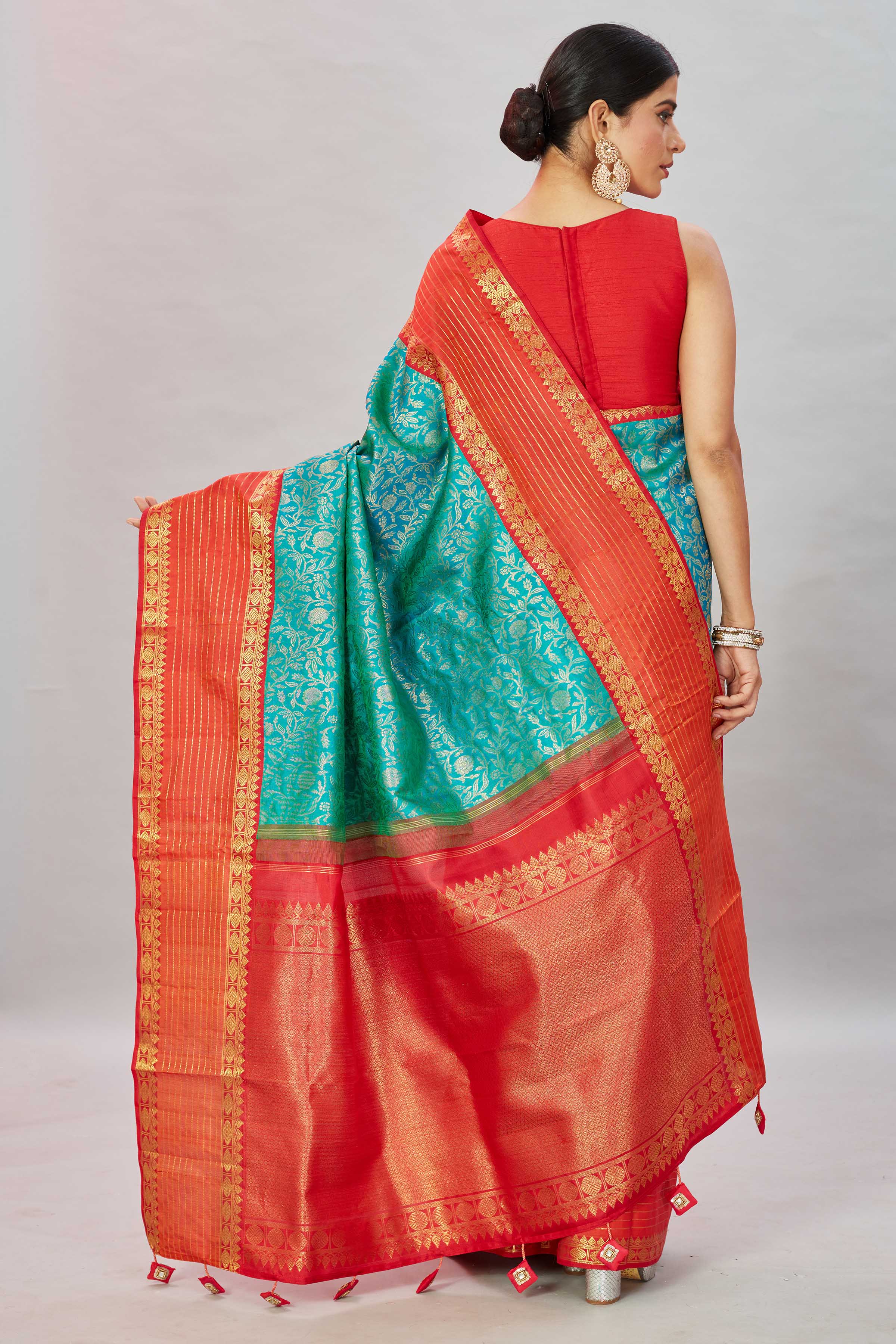 Buy sea green floral Kanjivaram silk saree online in USA with red zari stripes border. Look your best on festive occasions in latest designer sarees, pure silk sarees, Kanjivaram silk saris, handwoven saris, tussar silk sarees, embroidered saris from Pure Elegance Indian clothing store in USA.-back
