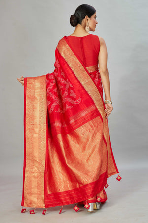 Buy red bandhej Kanjivaram silk saree online in USA with ikkat border. Look your best on festive occasions in latest designer sarees, pure silk sarees, Kanjivaram silk saris, handwoven saris, tussar silk sarees, embroidered saris from Pure Elegance Indian clothing store in USA.-back