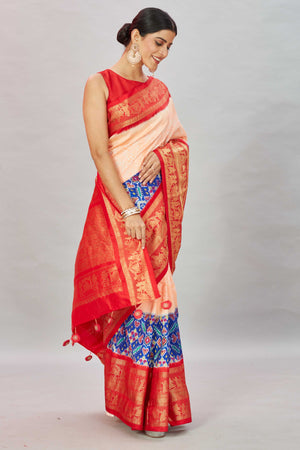 Shop peach bandhej Kanjivaram silk saree online in USA with blue ikkat border. Look your best on festive occasions in latest designer sarees, pure silk sarees, Kanjivaram silk saris, handwoven saris, tussar silk sarees, embroidered saris from Pure Elegance Indian clothing store in USA.-side