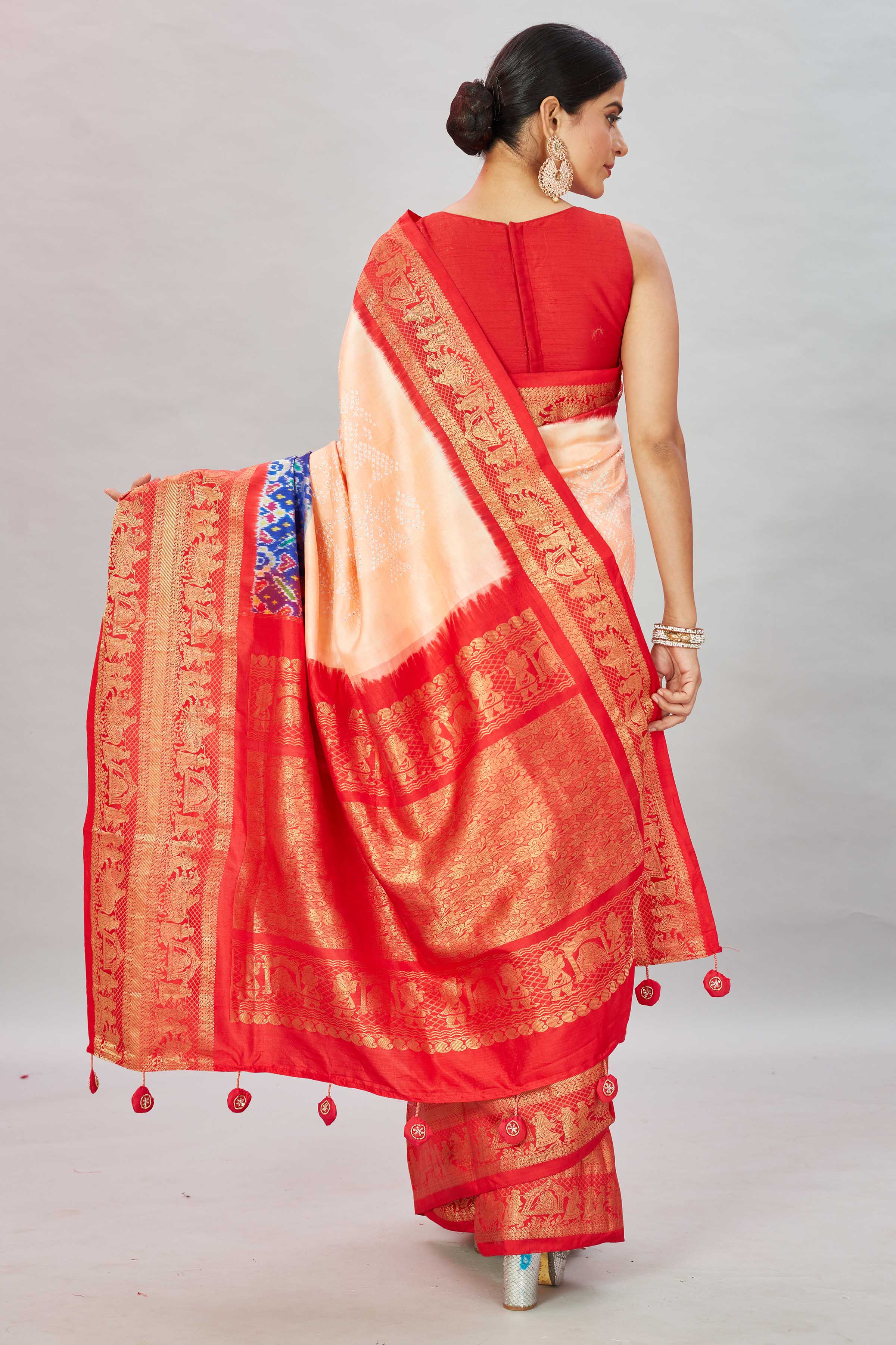 Shop peach bandhej Kanjivaram silk saree online in USA with blue ikkat border. Look your best on festive occasions in latest designer sarees, pure silk sarees, Kanjivaram silk saris, handwoven saris, tussar silk sarees, embroidered saris from Pure Elegance Indian clothing store in USA.-back