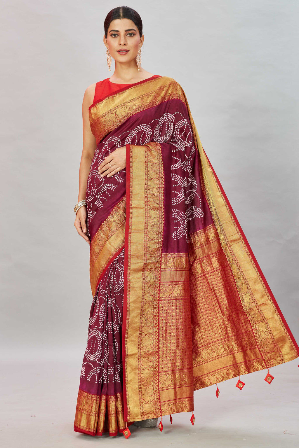 Buy wine color bandhej Kanjivaram silk sari online in USA with zari border. Look your best on festive occasions in latest designer sarees, pure silk sarees, Kanjivaram silk saris, handwoven saris, tussar silk sarees, embroidered saris from Pure Elegance Indian clothing store in USA.-full view