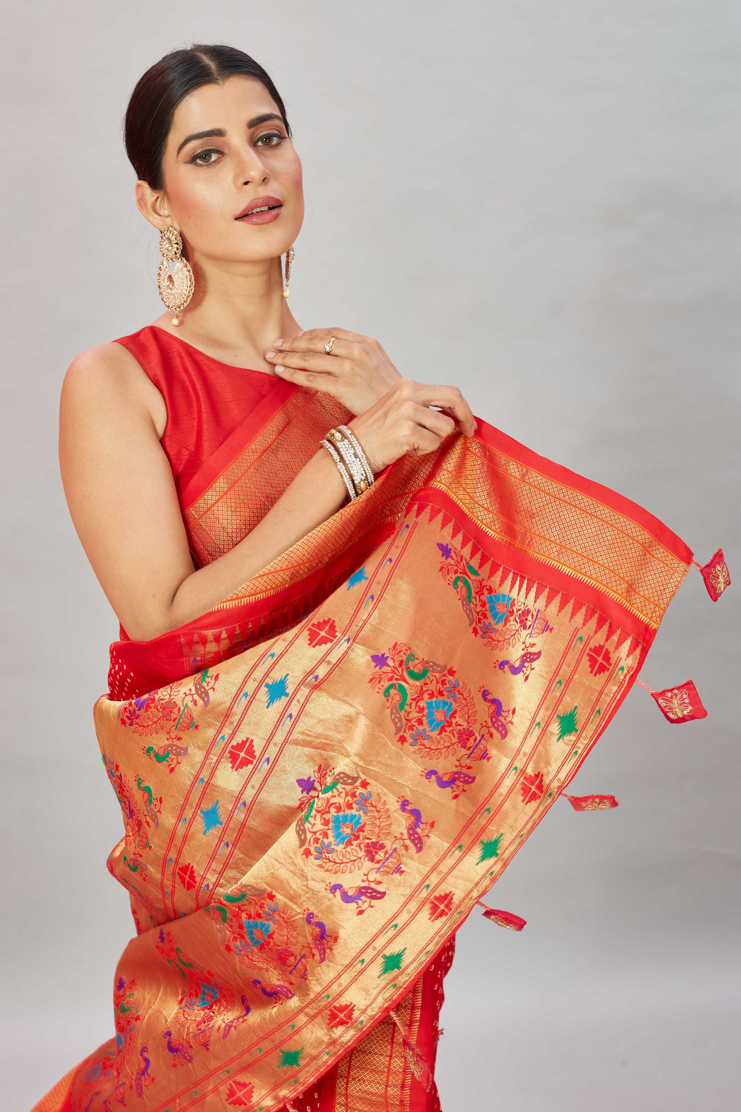 Shop red bandhej Kanjivaram silk sari online in USA with Paithani pallu. Look your best on festive occasions in latest designer sarees, pure silk sarees, Kanjivaram silk saris, handwoven saris, tussar silk sarees, embroidered saris from Pure Elegance Indian clothing store in USA.-closeup
