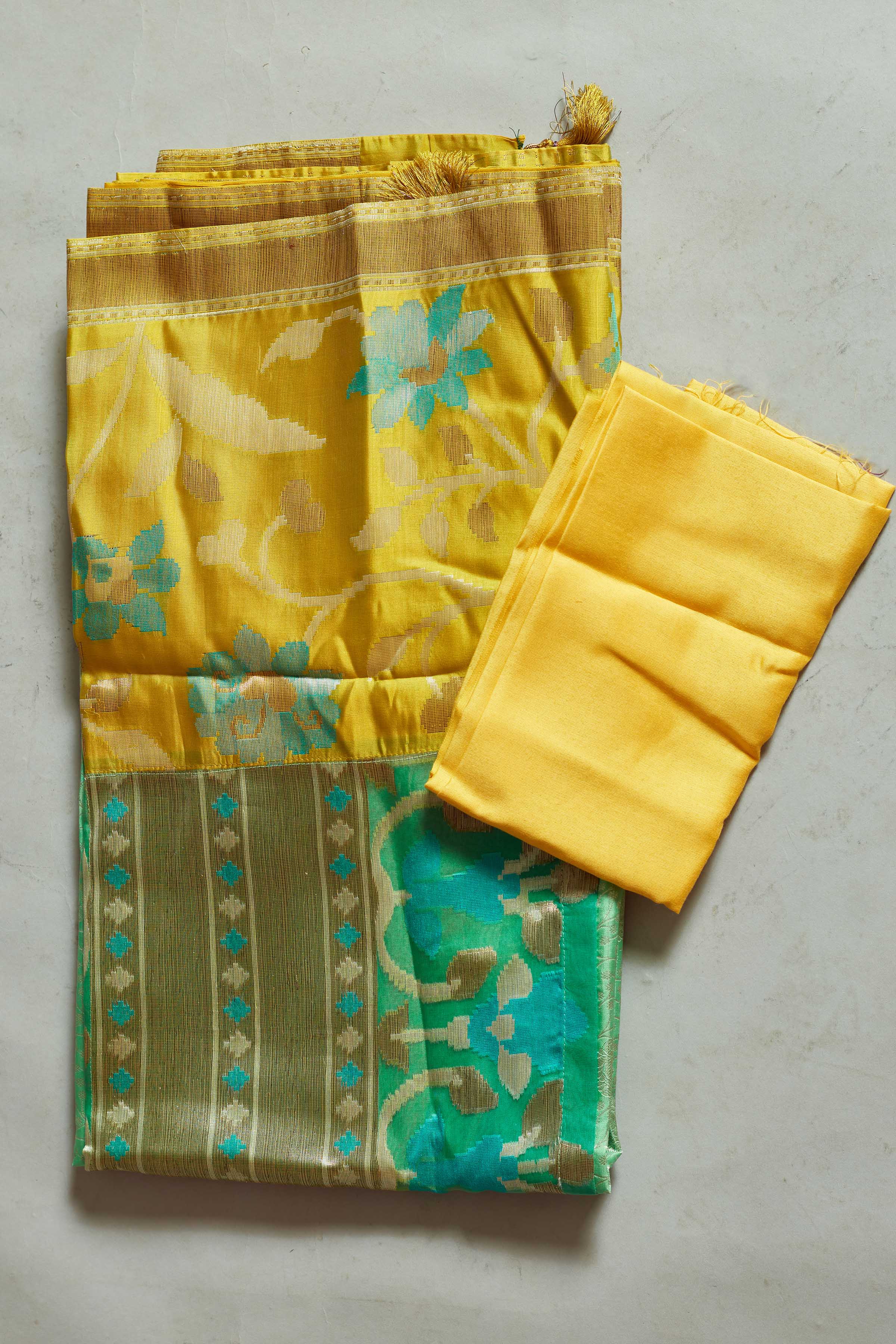 Buy pastel green Kanjivaram silk sari online in USA with yellow floral border. Look your best on festive occasions in latest designer sarees, pure silk sarees, Kanjivaram silk saris, handwoven saris, tussar silk sarees, embroidered saris from Pure Elegance Indian clothing store in USA.-blouse