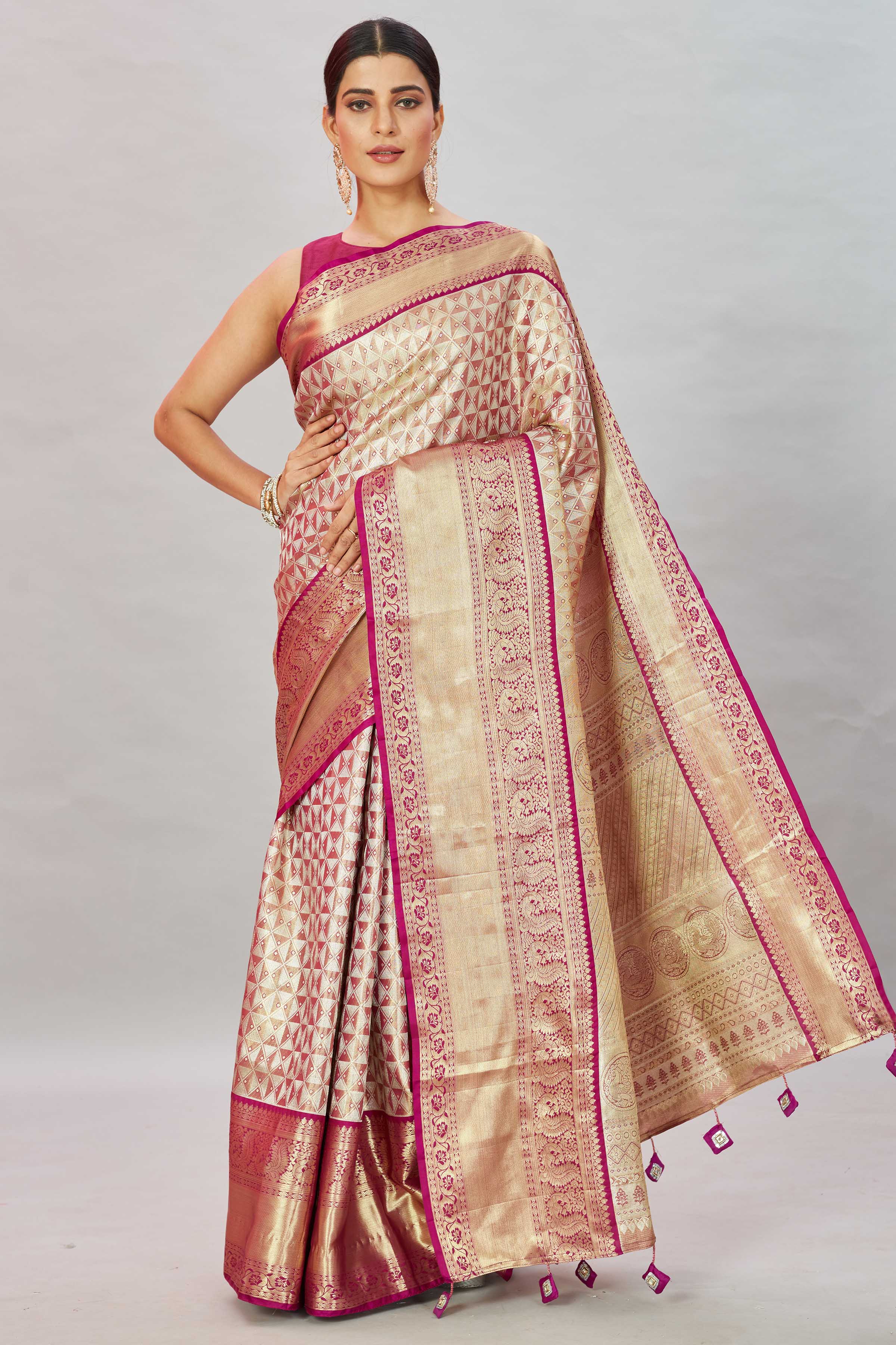 Shop golden pink heavy Kanjivaram silk sari online in USA. Look your best on festive occasions in latest designer sarees, pure silk sarees, Kanjivaram silk saris, handwoven saris, tussar silk sarees, embroidered saris from Pure Elegance Indian clothing store in USA.-full view