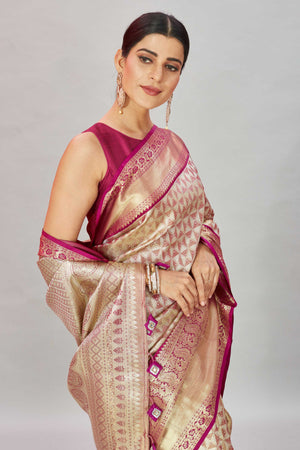 Shop golden pink heavy Kanjivaram silk sari online in USA. Look your best on festive occasions in latest designer sarees, pure silk sarees, Kanjivaram silk saris, handwoven saris, tussar silk sarees, embroidered saris from Pure Elegance Indian clothing store in USA.-closeup