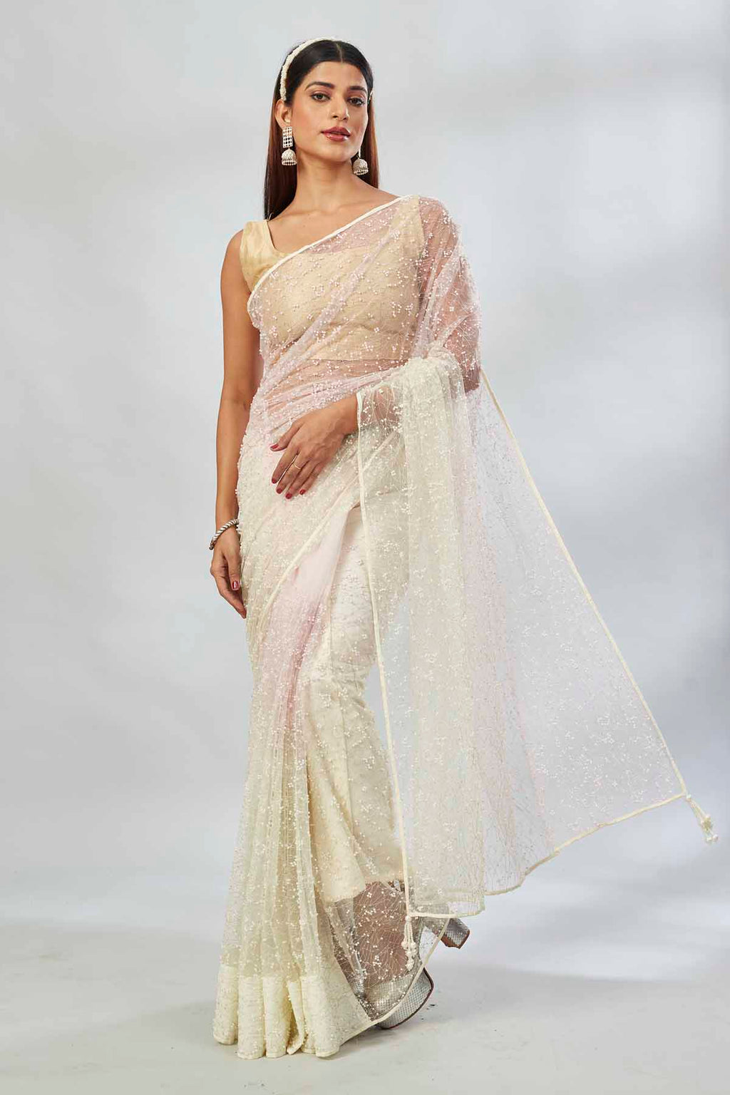 Shop cream net embroidered designer sari online in USA. Look your best on festive occasions in latest designer saris, pure silk saris, Kanjivaram silk sarees, handwoven saris, silk sarees, linen sarees,  embroidered sarees from Pure Elegance Indian clothing store in USA.-full view