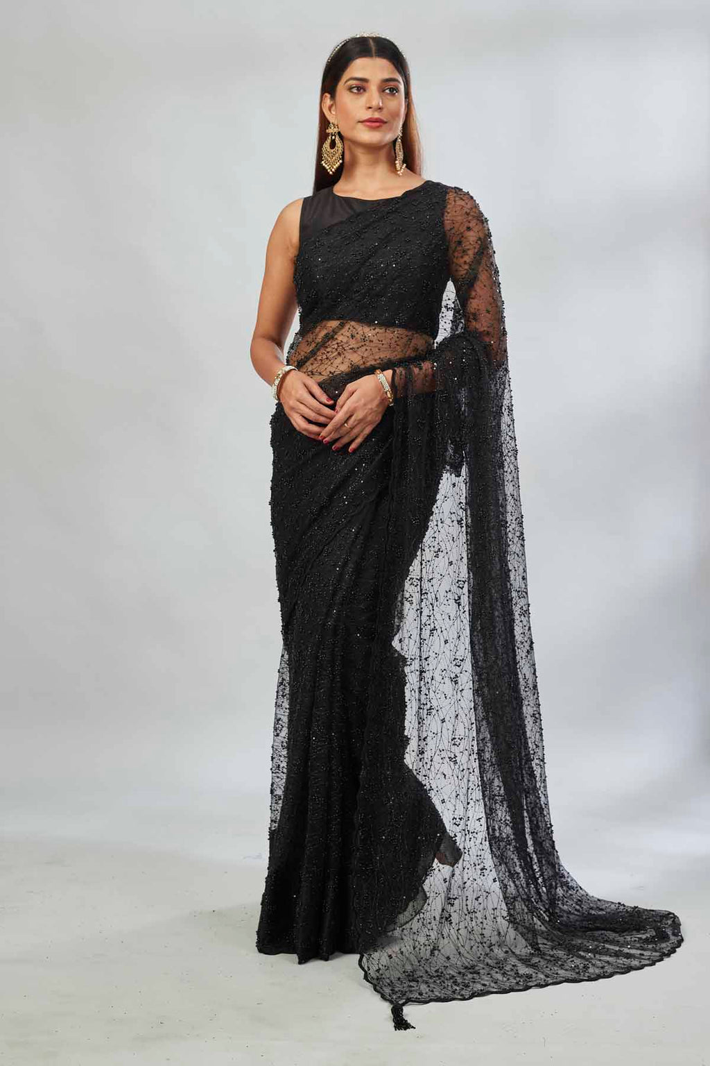Shop black net embroidered designer sari online in USA. Look your best on festive occasions in latest designer saris, pure silk saris, Kanjivaram silk sarees, handwoven saris, tussar silk sarees, linen sarees,  embroidered sarees from Pure Elegance Indian clothing store in USA.-full view