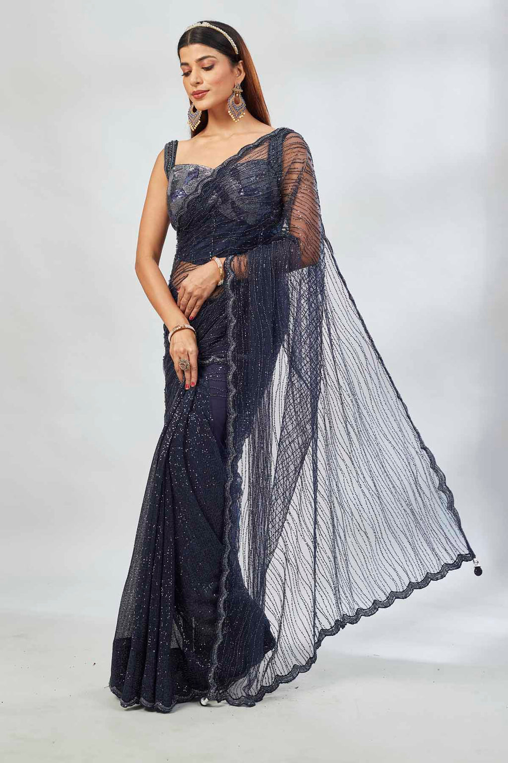 Shop navy blue lace net embroidered saree online in USA with blouse. Look your best on festive occasions in latest designer saris, pure silk saris, Kanjivaram silk sarees, handwoven saris, tussar silk sarees, linen sarees,  embroidered sarees from Pure Elegance Indian clothing store in USA.-full view