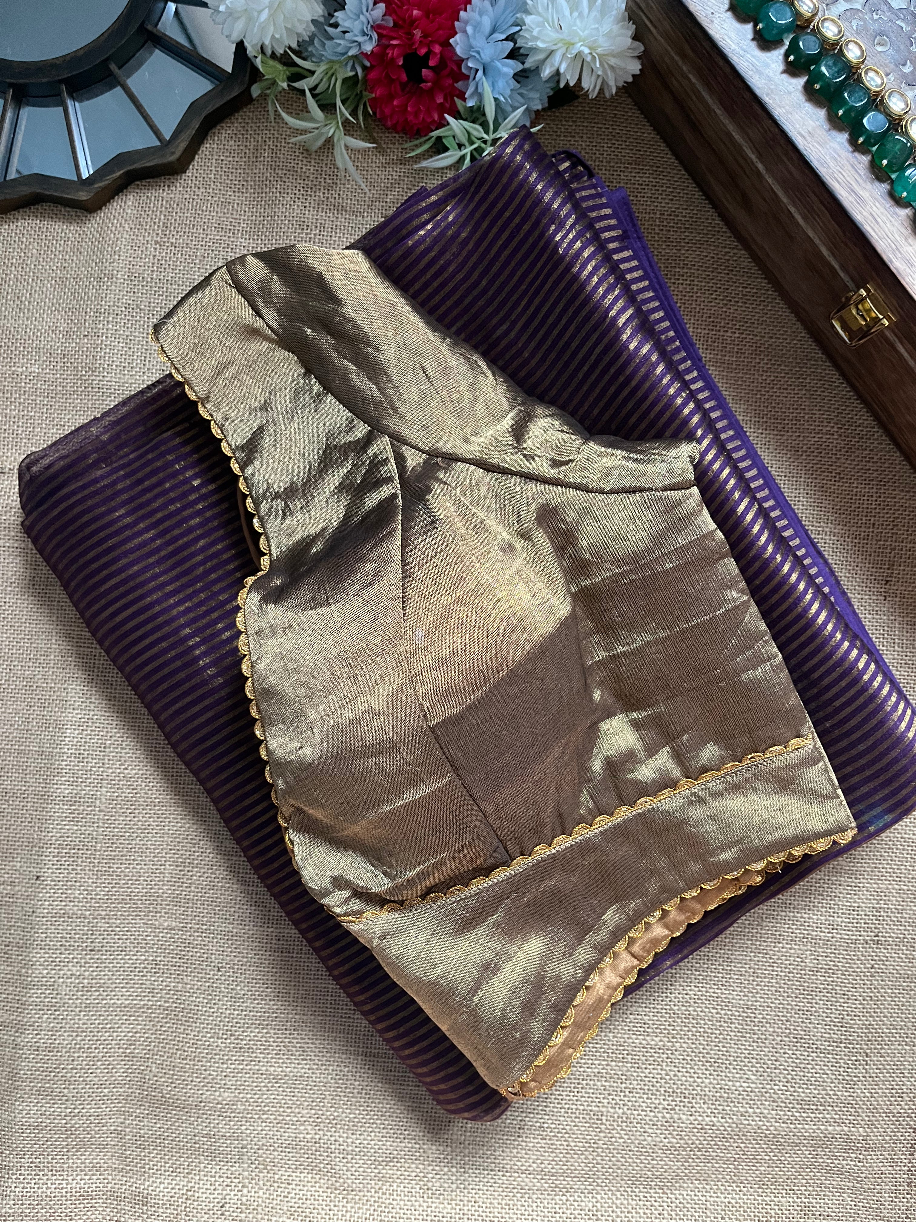 Shop purple tissue zari saree online in USA with antique gold tissue blouse. Look your best on festive occasions in latest designer saris, pure silk saris, Kanjivaram silk sarees, handwoven saris, tussar silk sarees, linen sarees,  summer sarees from Pure Elegance Indian clothing store in USA.-side