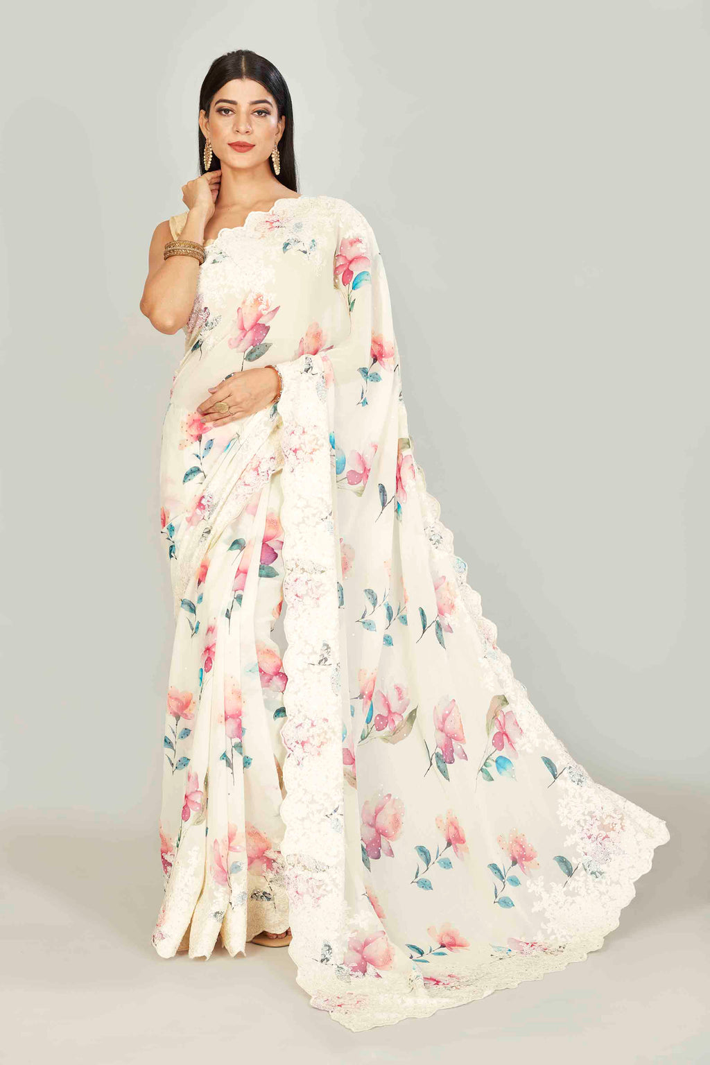 Shop off-white floral georgette sari online in USA with embroidered scalloped border. Look your best on festive occasions in latest designer saris, pure silk saris, tissue silk sarees, handwoven saris, tussar silk sarees, linen sarees,  summer sarees from Pure Elegance Indian clothing store in USA.-full view