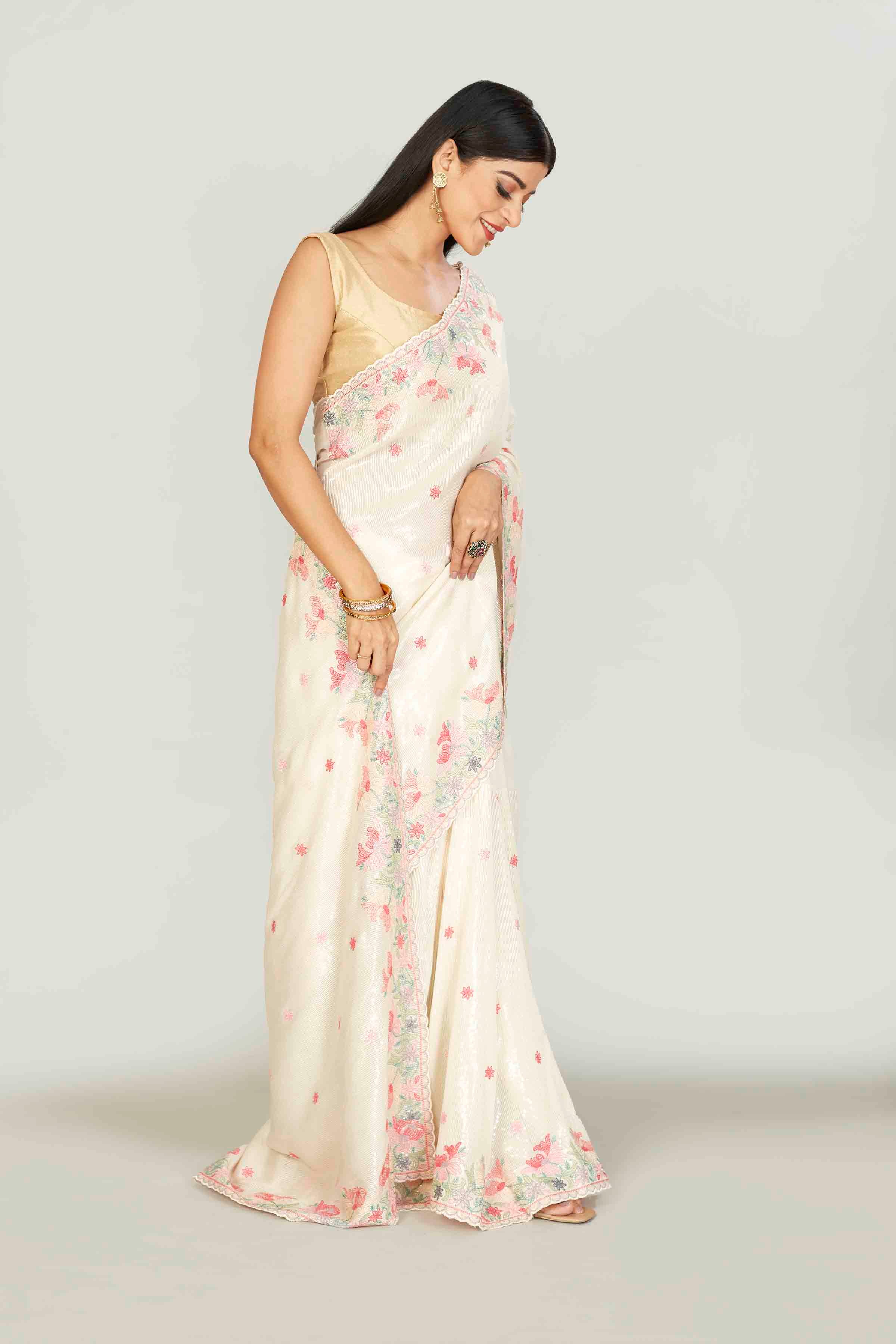 Shop cream tissue sari online in USA with embroidered border and buti. Look your best on festive occasions in latest designer saris, pure silk saris, tissue silk sarees, handwoven saris, tussar silk sarees, linen sarees,  summer sarees from Pure Elegance Indian clothing store in USA.-side