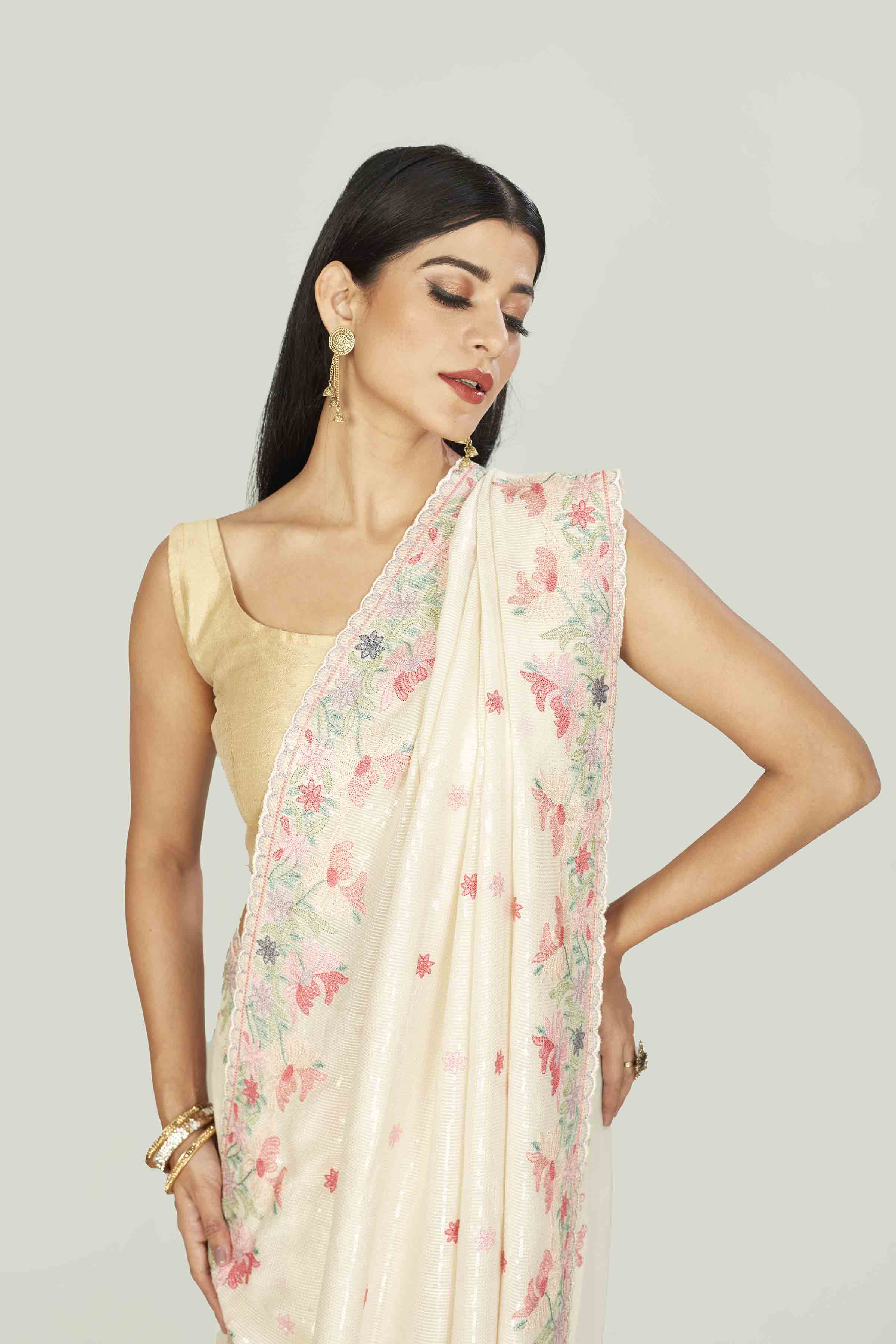 92A813 Cream Tissue Saree With Embroidered Border And Buti