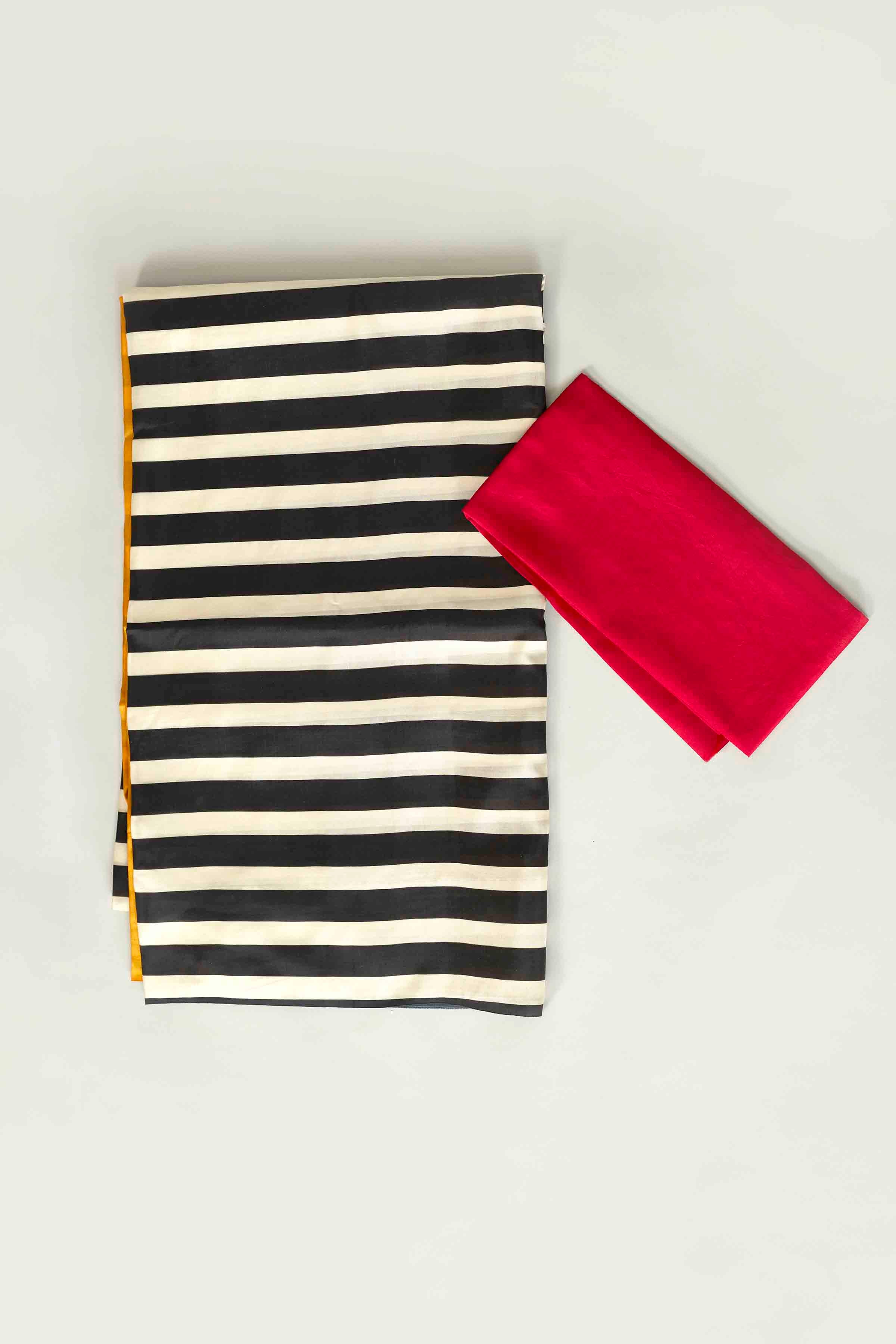 Buy white and black striped silk sari online in USA with yellow red pallu. Look your best on festive occasions in latest designer saris, pure silk saris, tissue silk sarees, handwoven saris, tussar silk sarees, linen sarees,  summer sarees from Pure Elegance Indian clothing store in USA.-blouse