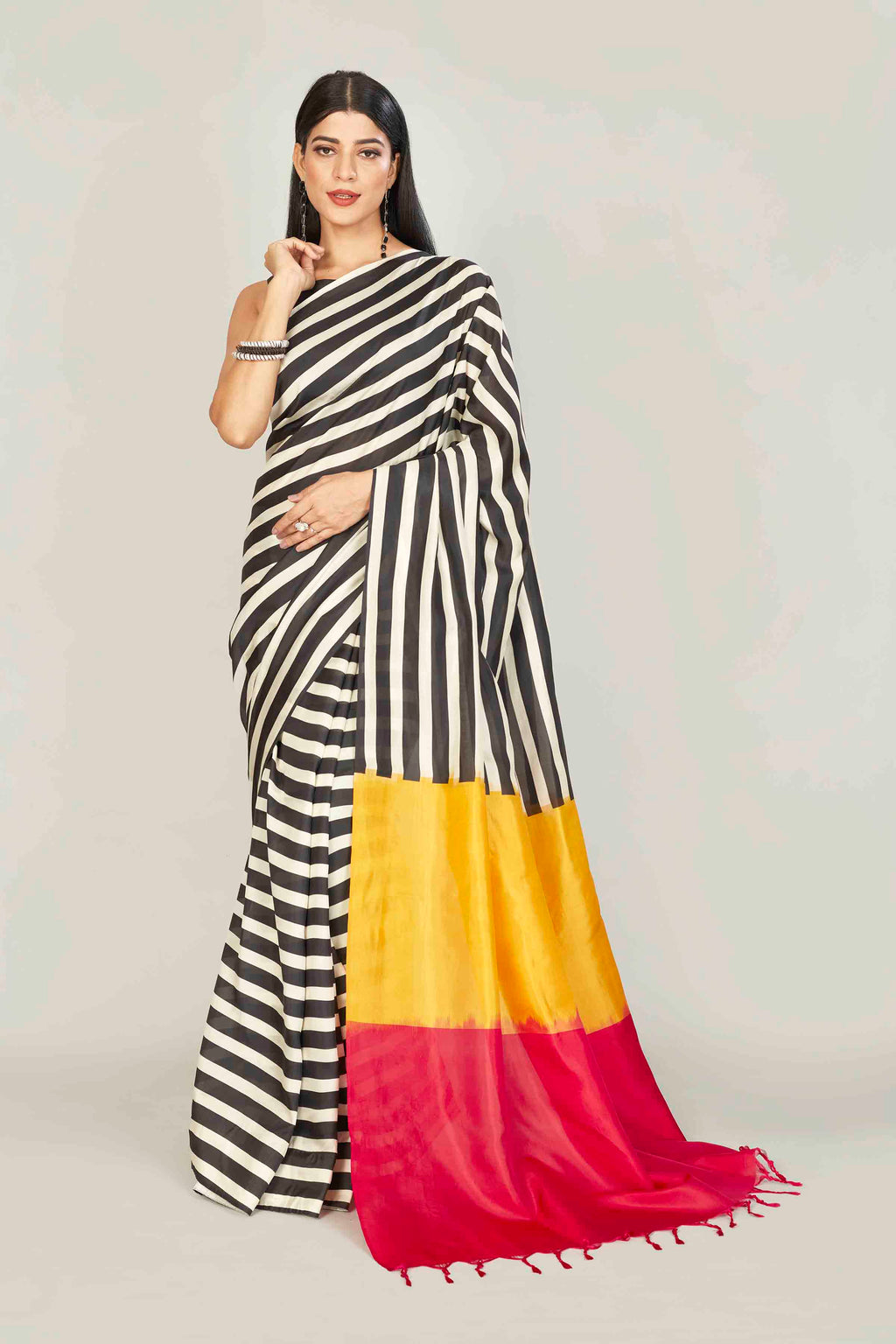 Buy white and black striped silk sari online in USA with yellow red pallu. Look your best on festive occasions in latest designer saris, pure silk saris, tissue silk sarees, handwoven saris, tussar silk sarees, linen sarees,  summer sarees from Pure Elegance Indian clothing store in USA.-full view