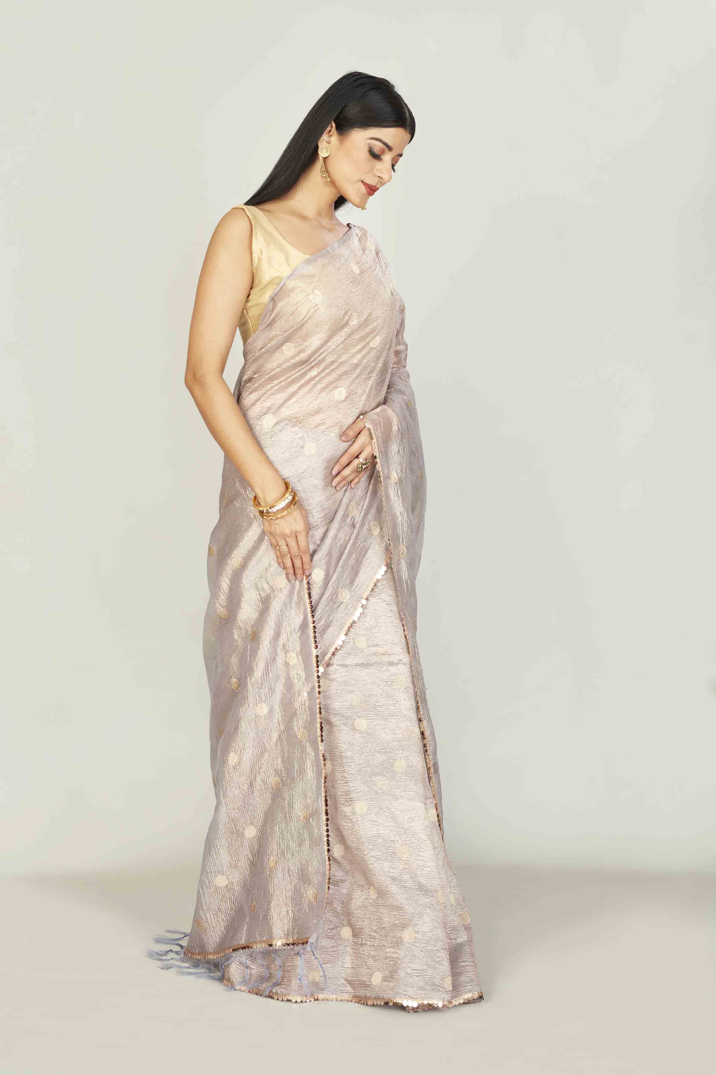 Shop stunning grey floral print Kota silk sari online in USA. Look your best on festive occasions in latest designer saris, pure silk saris, tissue silk sarees, handwoven saris, tussar silk sarees, linen sarees,  summer sarees from Pure Elegance Indian clothing store in USA.-side