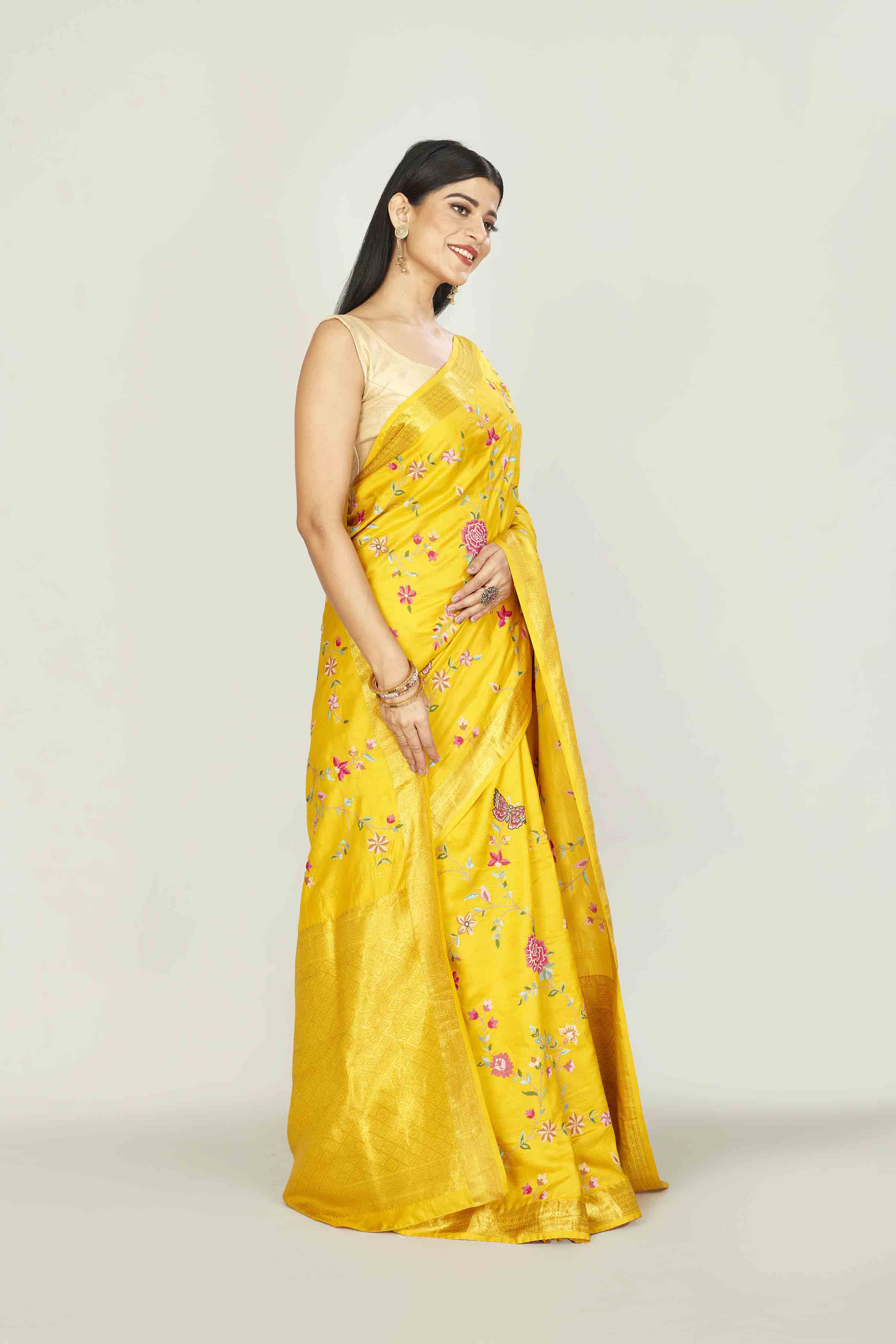 Shop yellow Gadhwal silk saree online in USA with embroidery. Look your best on festive occasions in latest designer saris, pure silk saris, tissue silk sarees, handwoven saris, tussar silk sarees, linen sarees,  summer sarees from Pure Elegance Indian clothing store in USA.-side