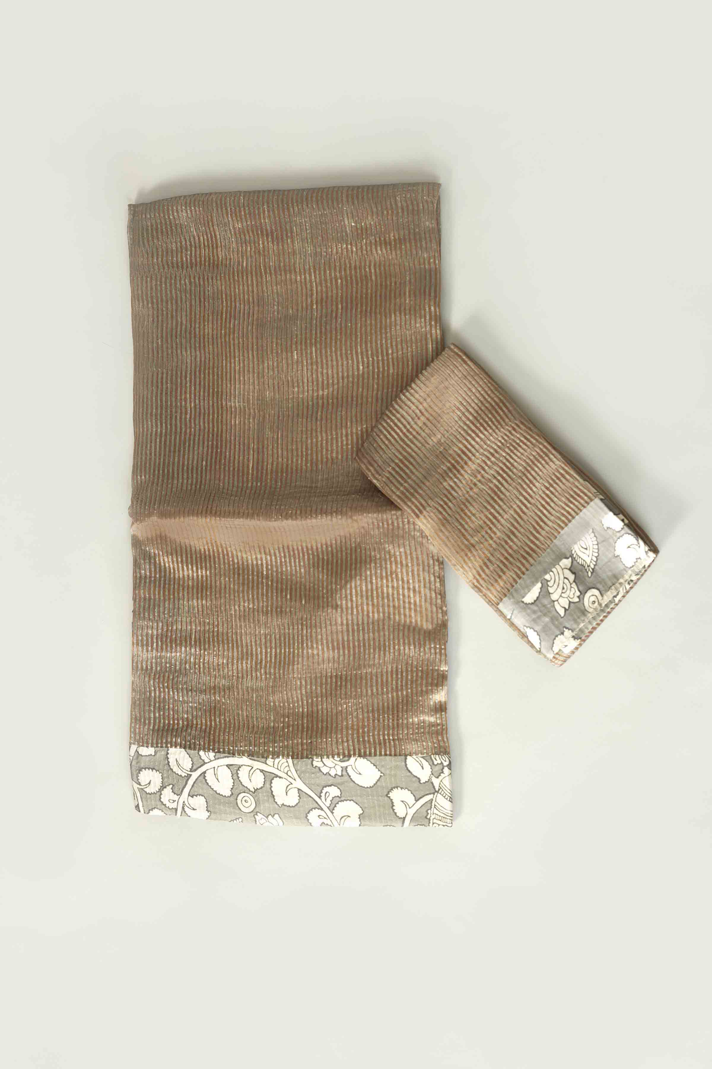 Shop beige tissue silk saree online in USA with printed border. Look your best on festive occasions in latest designer saris, pure silk saris, tissue silk sarees, handwoven saris, tussar silk sarees, linen sarees,  summer sarees from Pure Elegance Indian clothing store in USA.-blouse