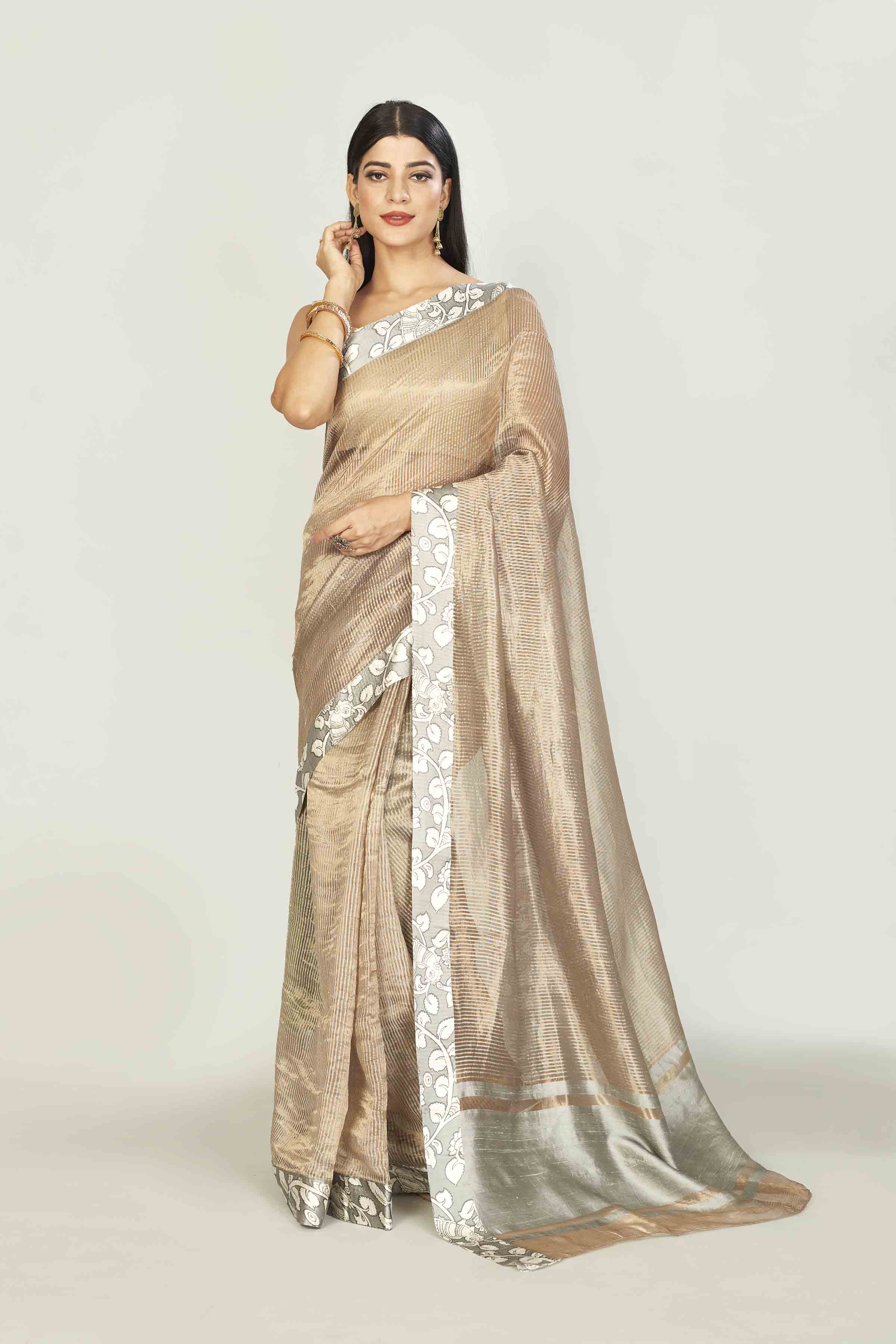 Shop beige tissue silk saree online in USA with printed border. Look your best on festive occasions in latest designer saris, pure silk saris, tissue silk sarees, handwoven saris, tussar silk sarees, linen sarees,  summer sarees from Pure Elegance Indian clothing store in USA.-full view