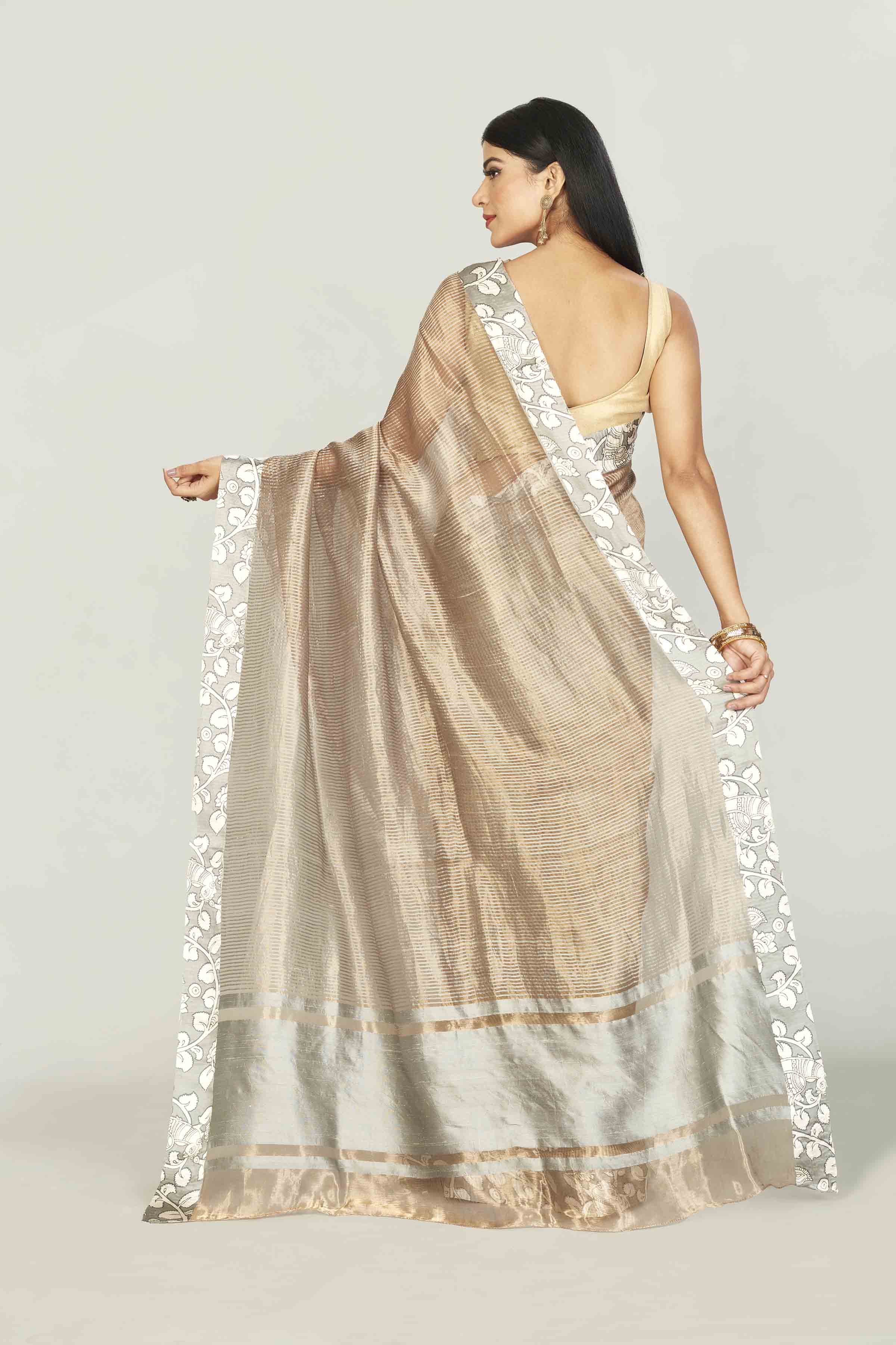 Shop beige tissue silk saree online in USA with printed border. Look your best on festive occasions in latest designer saris, pure silk saris, tissue silk sarees, handwoven saris, tussar silk sarees, linen sarees,  summer sarees from Pure Elegance Indian clothing store in USA.-back