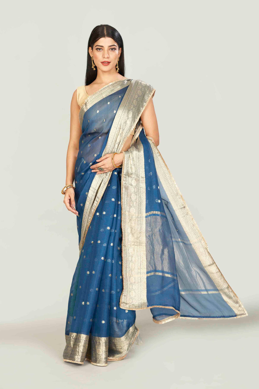 Shop blue Kora Banarasi saree online in USA with zari buta and border. Look your best on festive occasions in latest designer saris, pure silk saris, tissue silk sarees, handwoven saris, tussar silk sarees, linen sarees,  summer sarees from Pure Elegance Indian clothing store in USA.-full view