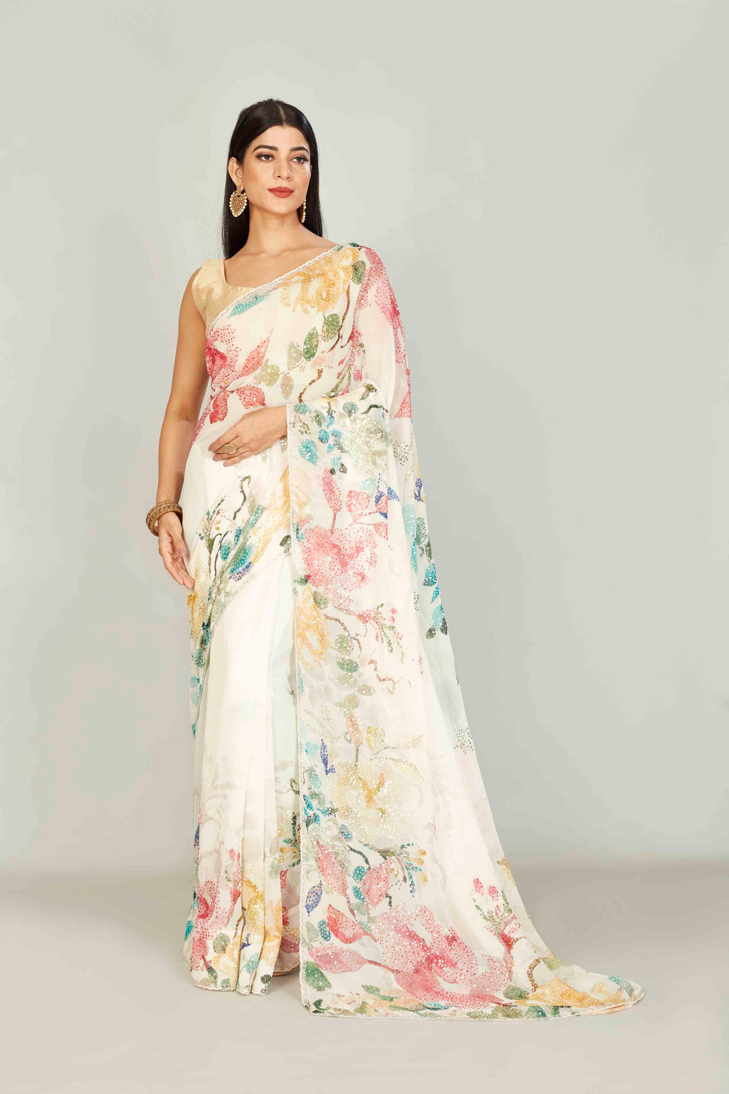 Shop cream floral crepe saree online in USA with stone work. Look your best on festive occasions in latest designer saris, pure silk saris, tissue silk sarees, handwoven saris, tussar silk sarees, linen sarees,  summer sarees from Pure Elegance Indian clothing store in USA.-full view