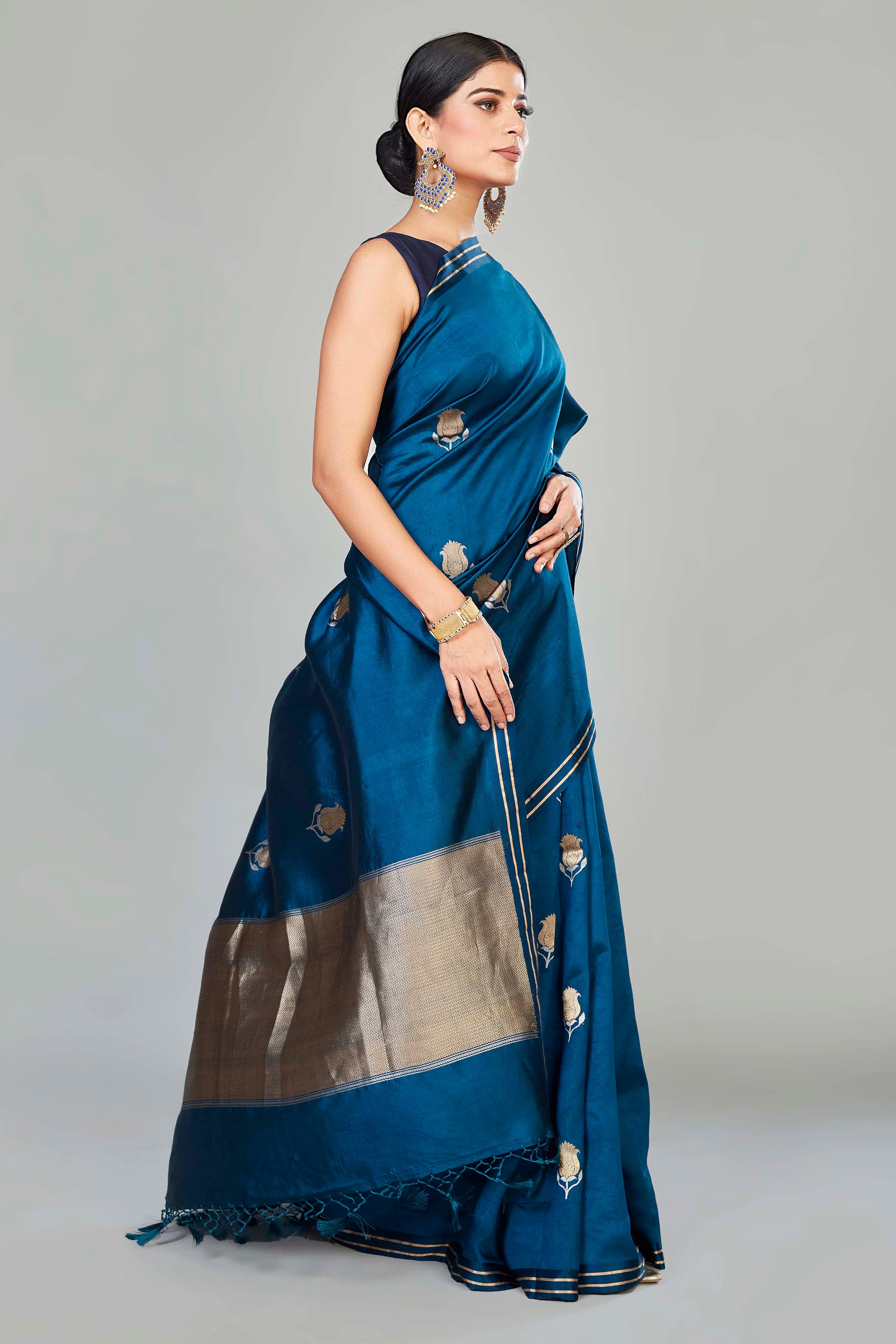 Shop blue tussar Banarasi sari online in USA with zari buta. Look your best on special occasions in Banarasi sarees, pure silk saris, handwoven sarees.-side