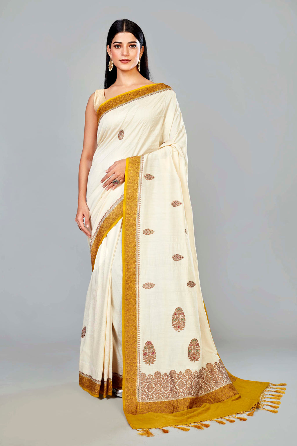 Shop cream muga Banarasi sari online in USA with mustard border and zari buta. Look your best on special occasions in Banarasi sarees, pure silk saris, handwoven sarees.-full view