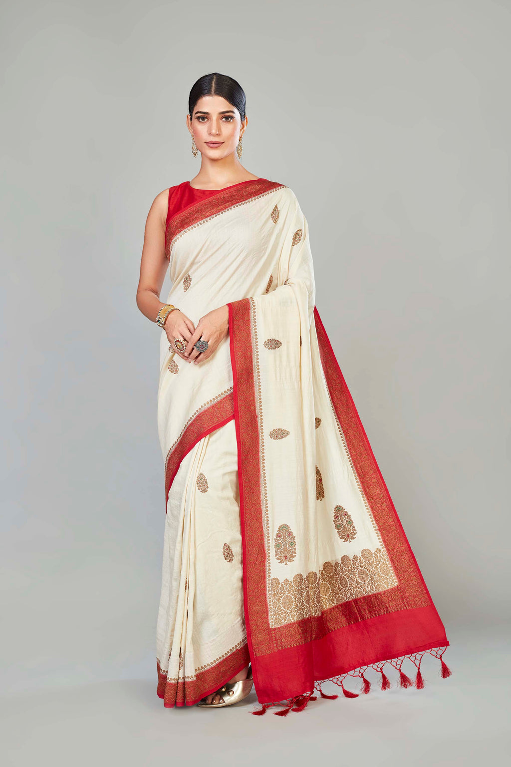 Buy cream muga Banarasi sari online in USA with red border and zari buta. Look your best on special occasions in Banarasi sarees, pure silk saris, handwoven sarees.-full view