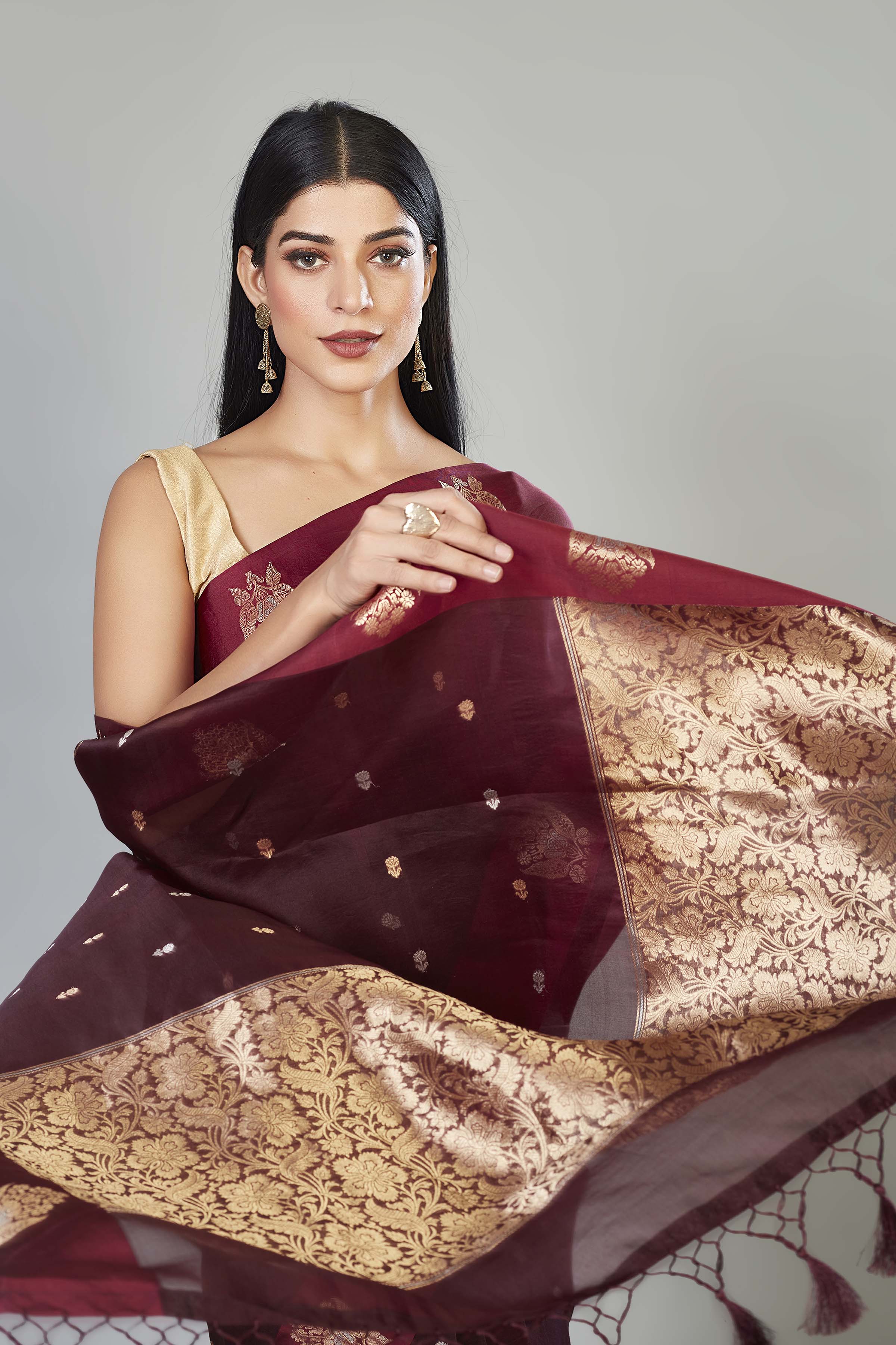 Buy wine color organza Banarasi sari online in USA with zari buta. Look your best on festive occasions in latest designer sarees, pure silk saris, handwoven sarees.-closeup