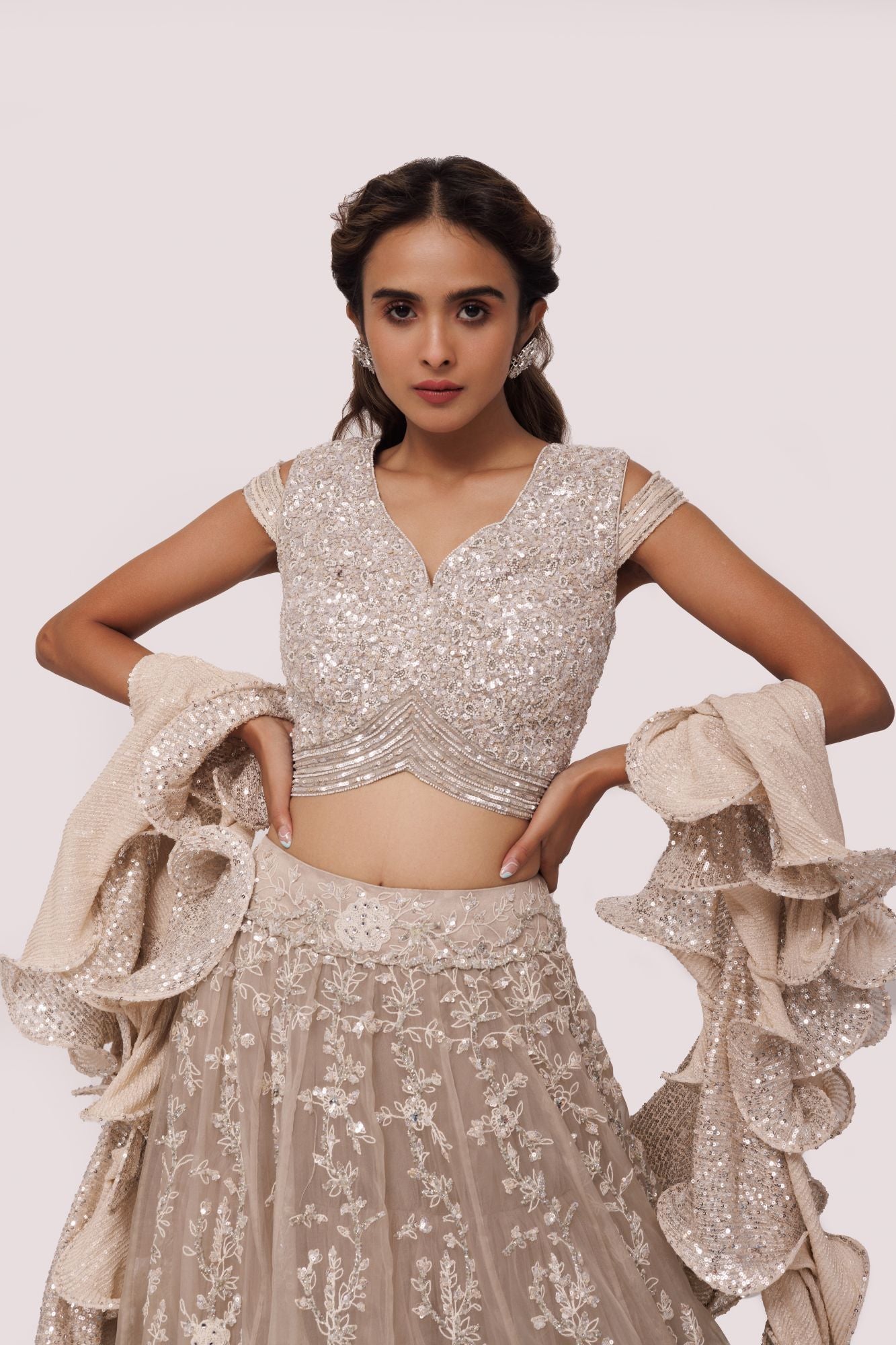 Shop bone white embroidered net and organza lehenga online in USA. Dazzle on weddings and special occasions with exquisite designer lehengas, Anarkali suit, sharara suit, Indowestern outfits, bridal lehengas from Pure Elegance Indian clothing store in the USA. -closeup