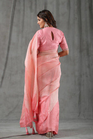 Shop beautiful light pink crushed tissue silk saree online in USA with blouse. Look royal on special occasions in exquisite designer sarees, pure silk sarees, handloom sarees, Bollywood sarees, embroidered sarees, Banarasi sarees, organza sarees from Pure Elegance Indian saree store in USA.-back