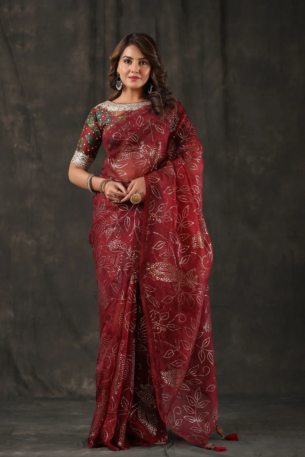 Shop beautiful maroon embellished organza silk saree online in USA. Look royal on special occasions in exquisite designer sarees, pure silk sarees, handloom sarees, Bollywood sarees, embroidered sarees, Banarasi sarees, organza sarees from Pure Elegance Indian saree store in USA.-full view