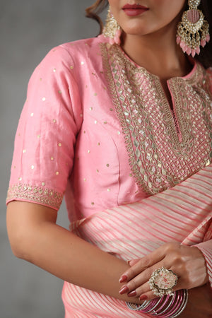 Shop beautiful light pink crushed tissue silk saree online in USA with blouse. Look royal on special occasions in exquisite designer sarees, pure silk sarees, handloom sarees, Bollywood sarees, embroidered sarees, Banarasi sarees, organza sarees from Pure Elegance Indian saree store in USA.-closeup