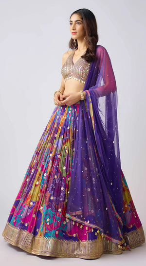 Shop purple multi print georgette mirror and shell work lehenga online in USA with dupatta. Shop bridal lehengas, designer sarees, bridesmaids lehengas, designer salwar suits, wedding lehengas, wedding sarees in USA from Pure Elegance Indian fashion clothing store.-side