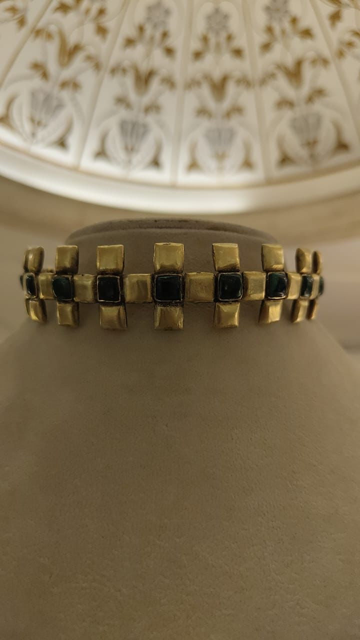 Shop black stone and gold plated contemporary choker online in USA. Make a style statement on special occasions in gold plated jewelry, designer jewellery, gold plated earrings, silver jewelry, silver earrings, silver necklace from Pure Elegance Indian fashion store in USA.-front