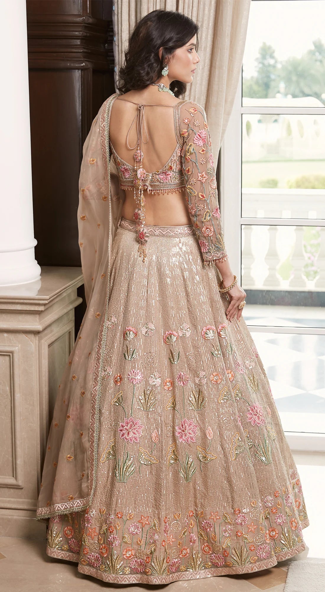 Buy beige embroidered designer lehenga with dupatta online in USA. Radiate elegance and class in designer lehengas, designer sarees, embroidered lehenga, bridal lehenga from Pure Elegance Indian fashion store in USA.-back