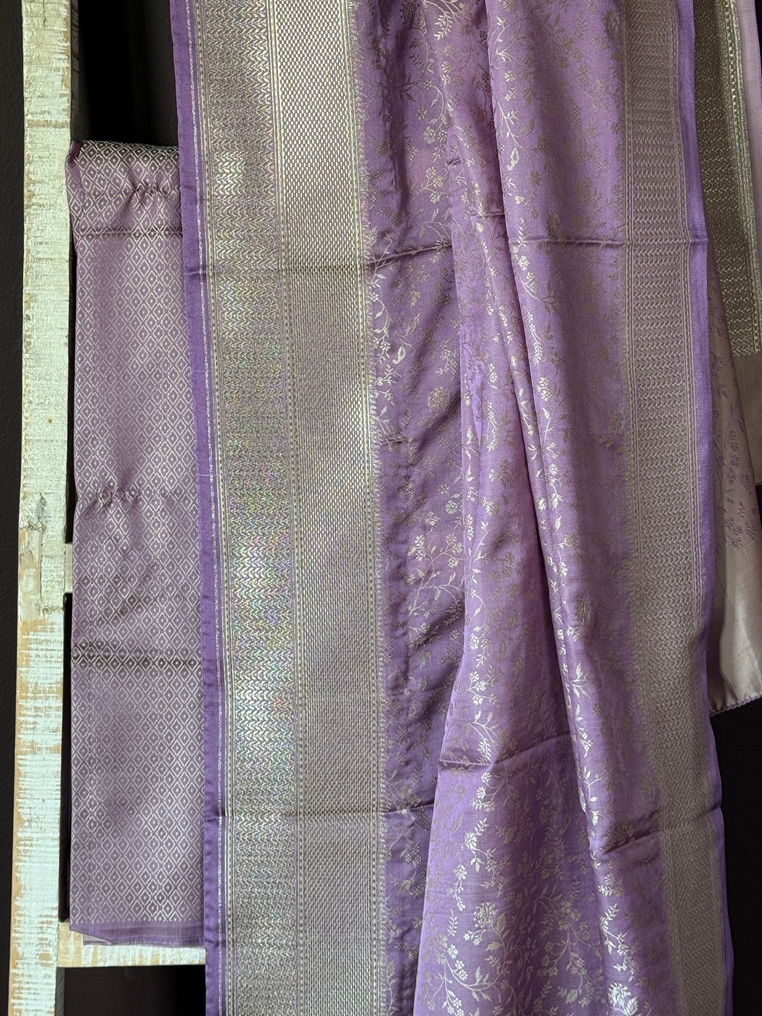 Shop lavender Mashru silk saree online in USA with silver border. Look your best on festive occasions in latest designer sarees, Banarasi sarees, handwoven sarees.-saree