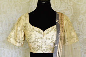 Shop grey and cream printed embroidered lehenga online in USA with dupatta. Get ready to dazzle on weddings and special occasions with an exquisite variety of Indian designer clothes from Pure Elegance Indian clothing store in USA. We have a splendid collection of bridal lehengas, designer sarees, Anarkali suits to make your look absolutely one of kind.-front