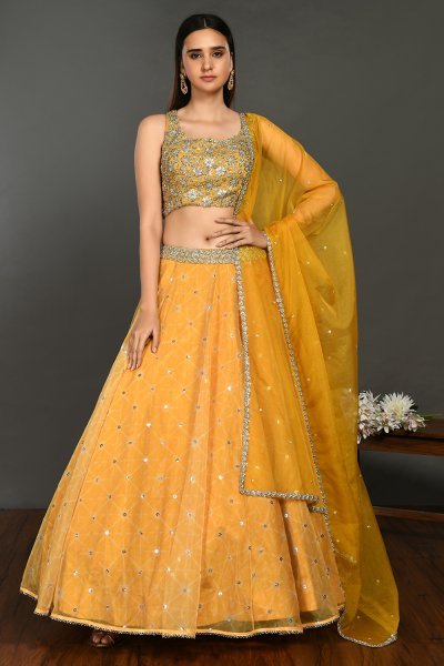 Buy stunning yellow organza lehenga online in USA with dupatta. Get festive ready in beautiful designer Anarkali suits, designer lehenga, wedding gowns, sharara suits, designer sarees from Pure Elegance Indian fashion store in USA.-front