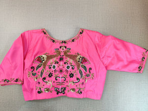 Shop stunning pink designer saree blouse online in USA with embroidered back. Elevate your Indian ethnic saree looks with beautiful readymade saree blouse, embroidered saree blouses, Banarasi saree blouse, designer sari blouses from Pure Elegance Indian fashion store in USA.-back