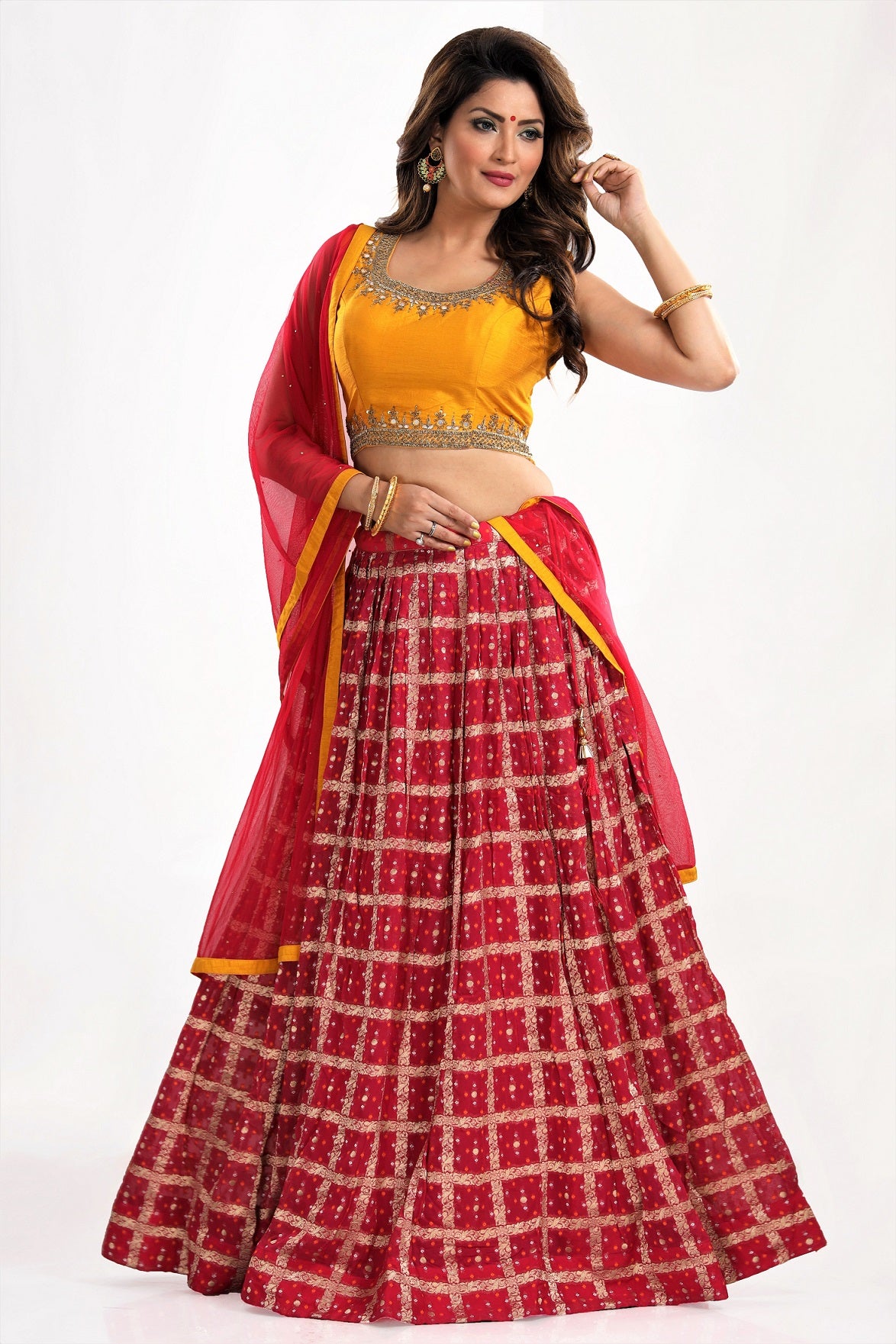 Shop gorgeous yellow and red dupion silk embroidered lehenga online in USA with net dupatta. Elevate your ethnic saree style with a tasteful collection of designer lehenga, bridal lehenga, Anarkali, designer salwar suits, Indian dresses, sharara suits from Pure Elegance Indian clothing store in USA.-full view