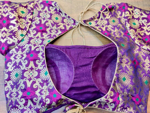 Buy stunning purple Benarasi silk designer saree blouse online in USA. Elevate your ethnic saree style with a tasteful collection of designer saree blouses, embroidered sari blouses, Banarasi blouses, silk saree blouses from Pure Elegance Indian clothing store in USA.-back