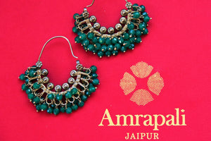 Buy silver Amrapali hoop earrings online from Pure Elegance with green stones. Our fashion store in USA brings an exquisite collection of silver Indian jewelry in USA for women-closeup