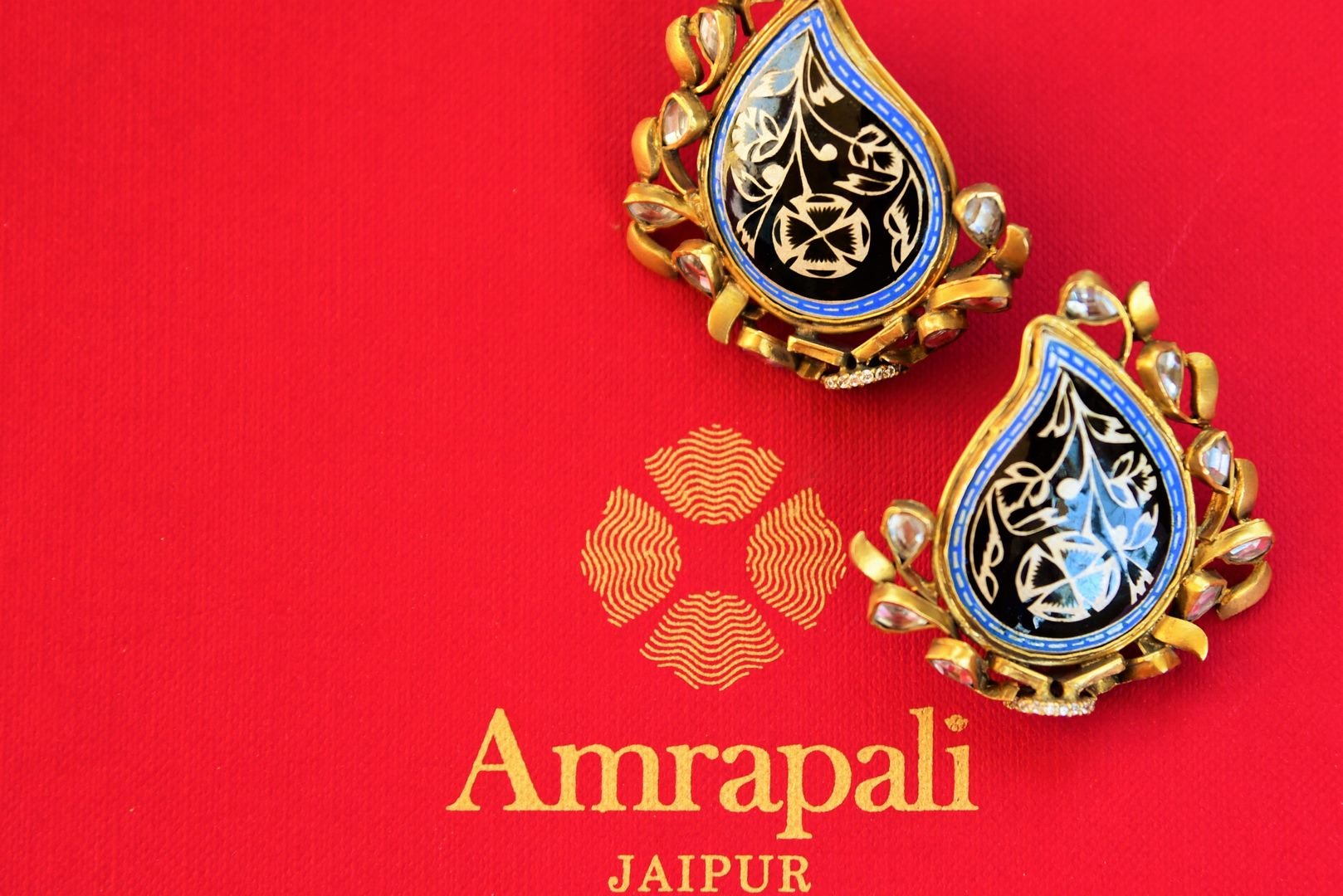 Buy silver gold plated Amrapali glass studs online from Pure Elegance. Our fashion store in USA brings an exquisite range of Indian earrings in USA for women-closeup