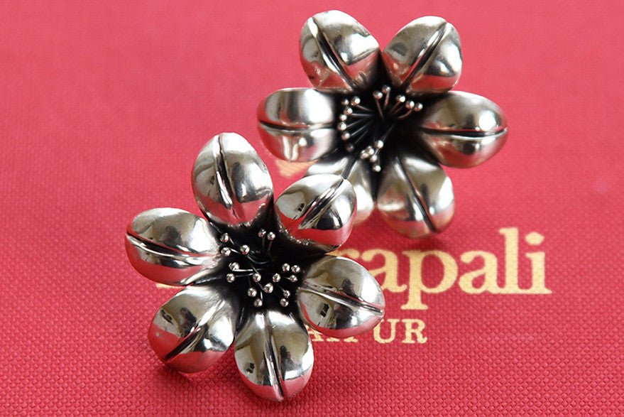 Indian Silver Plain floral design stud earring available at Pure Elegance in USA. Light weight fashion earring perfect for Indian as well as western outfits.- full view